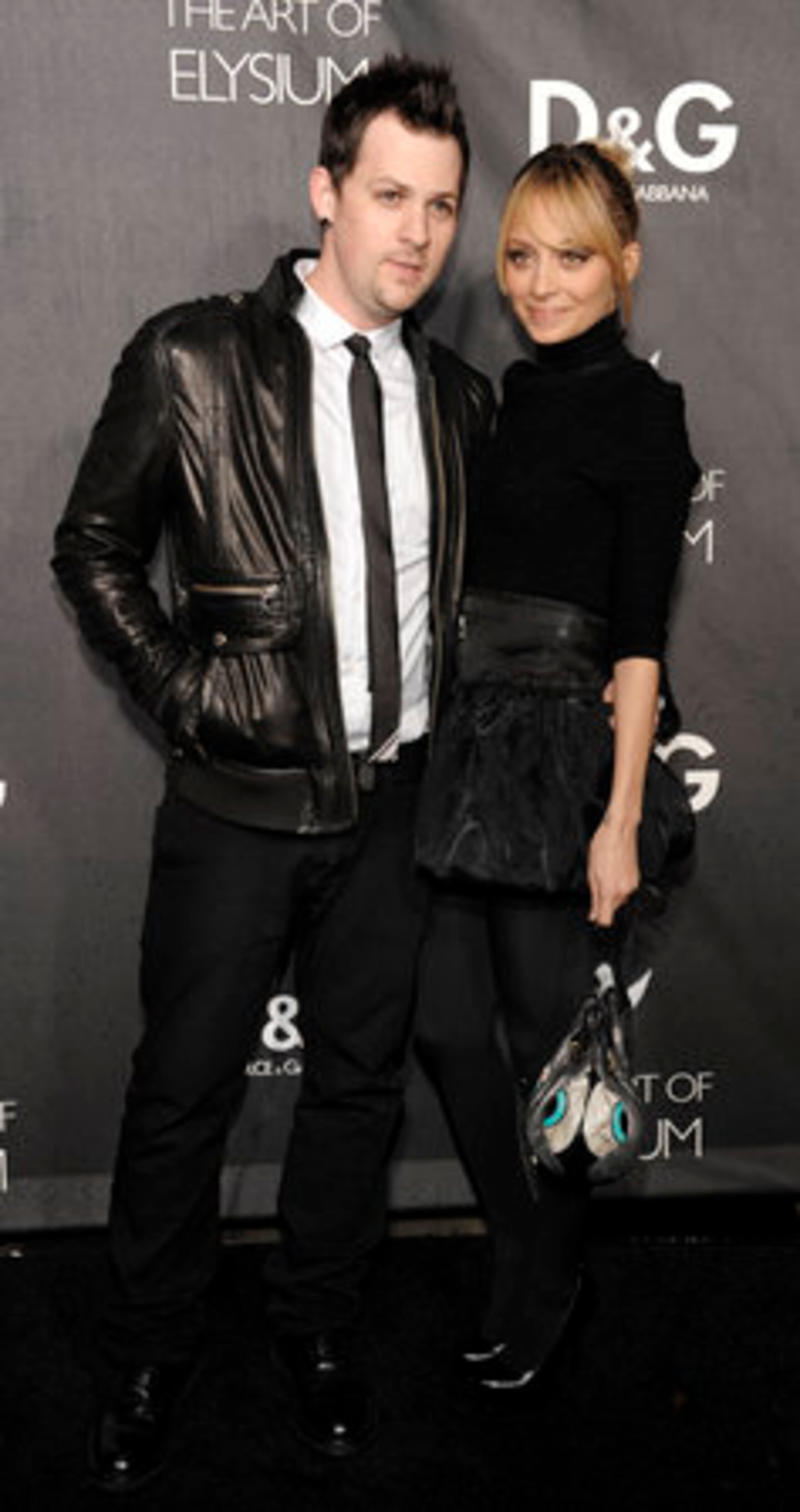 Yes, Nicole Richie, we know your dad was popular in the '80s, but that doesn't mean you need to recycle the decade's horrific bubble skirts. Hubbie Joel Madden has a little Brat Pack thing going, too.