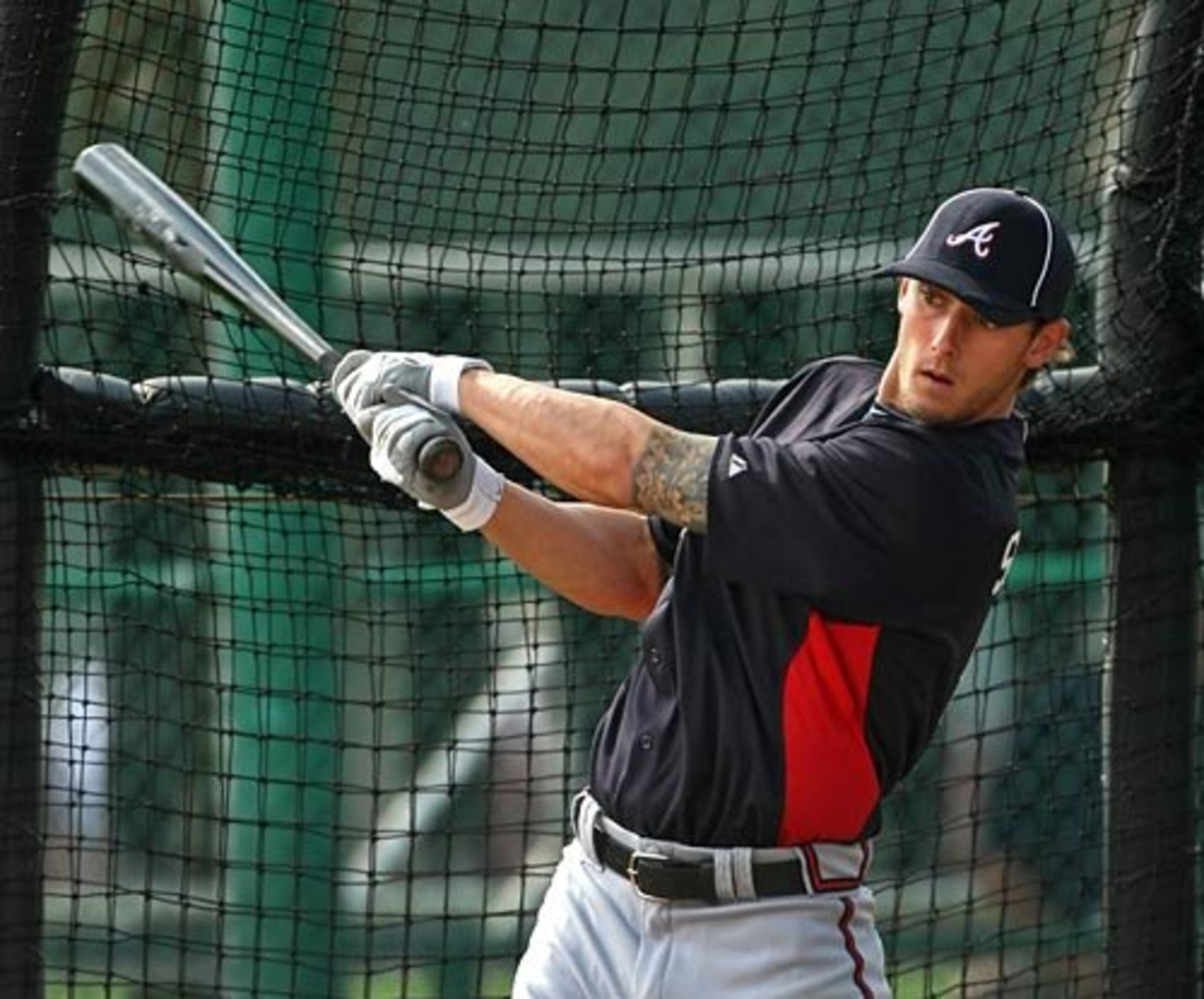 Braves outfielder Jordan Schafer looks strong in the cage during BP.