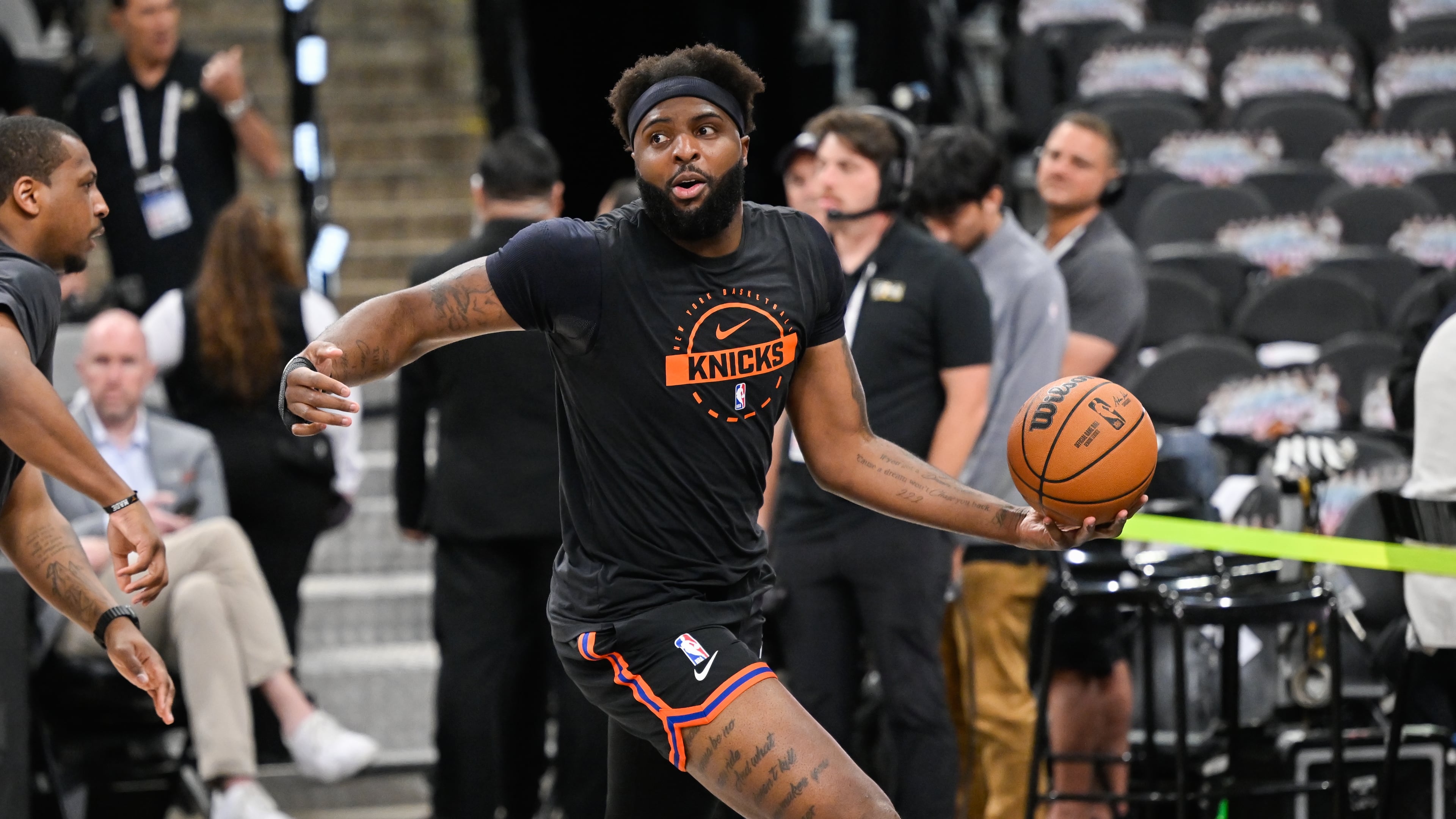 New York Knicks center Mitchell Robinson warms up prior to Game 5 of the NBA Finals basketball series against the San Antonio Spurs, Saturday, June 13, 2026, in San Antonio. (AP Photo/Darren Abate)