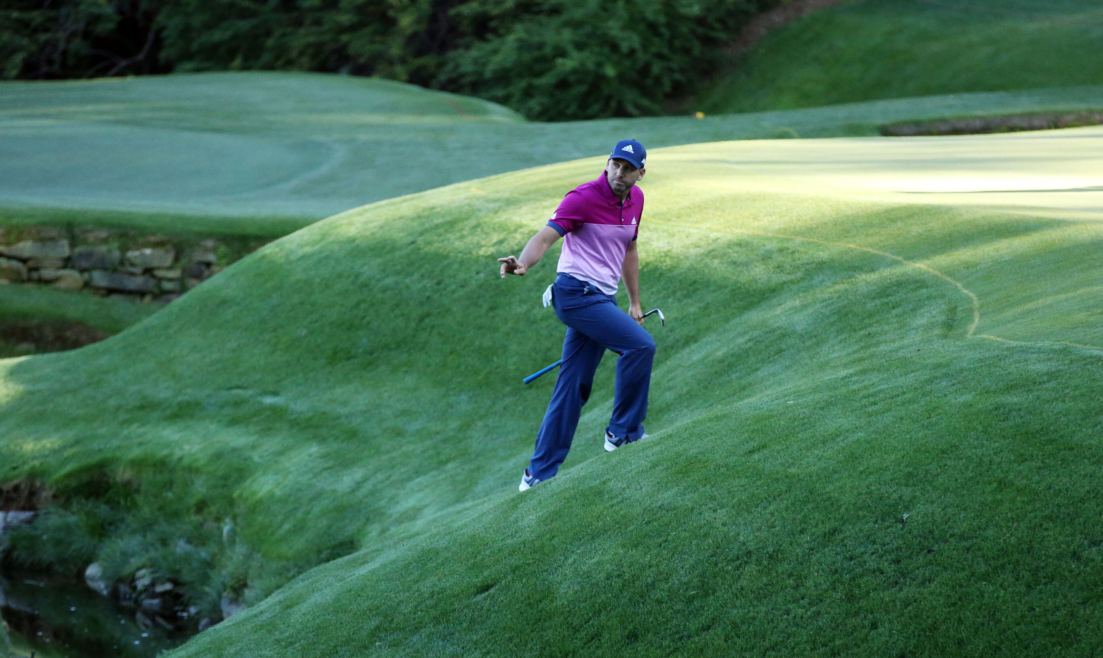 April 8, 2017 AUGUSTA Sergio Garcia waves to the crowd after chipping from the creek bank to the 13th green. Play begins in the third round of the 81st Masters tournament at the Augusta National Golf Club, Saturday, April 8, 2017. CURTIS COMPTON/ AJC
