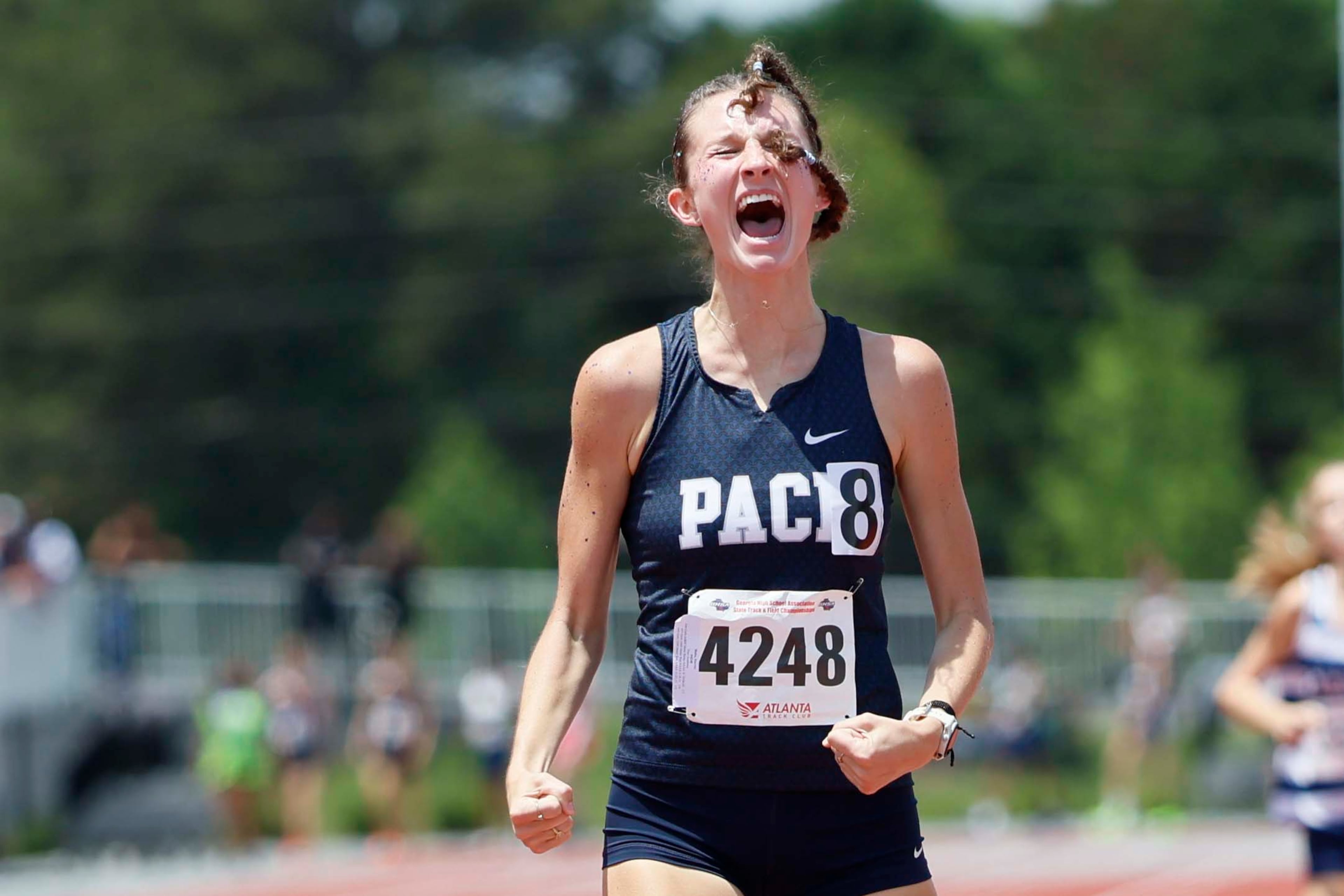 Pace Academy's Harriet Blaha reacts after winning the Girls 1600 meter run AAAA at the GHSA track and field state championships held at UGA's Spec Towns Track on Monday, May 11, 2026, in Athens. (Miguel Martinez/AJC)