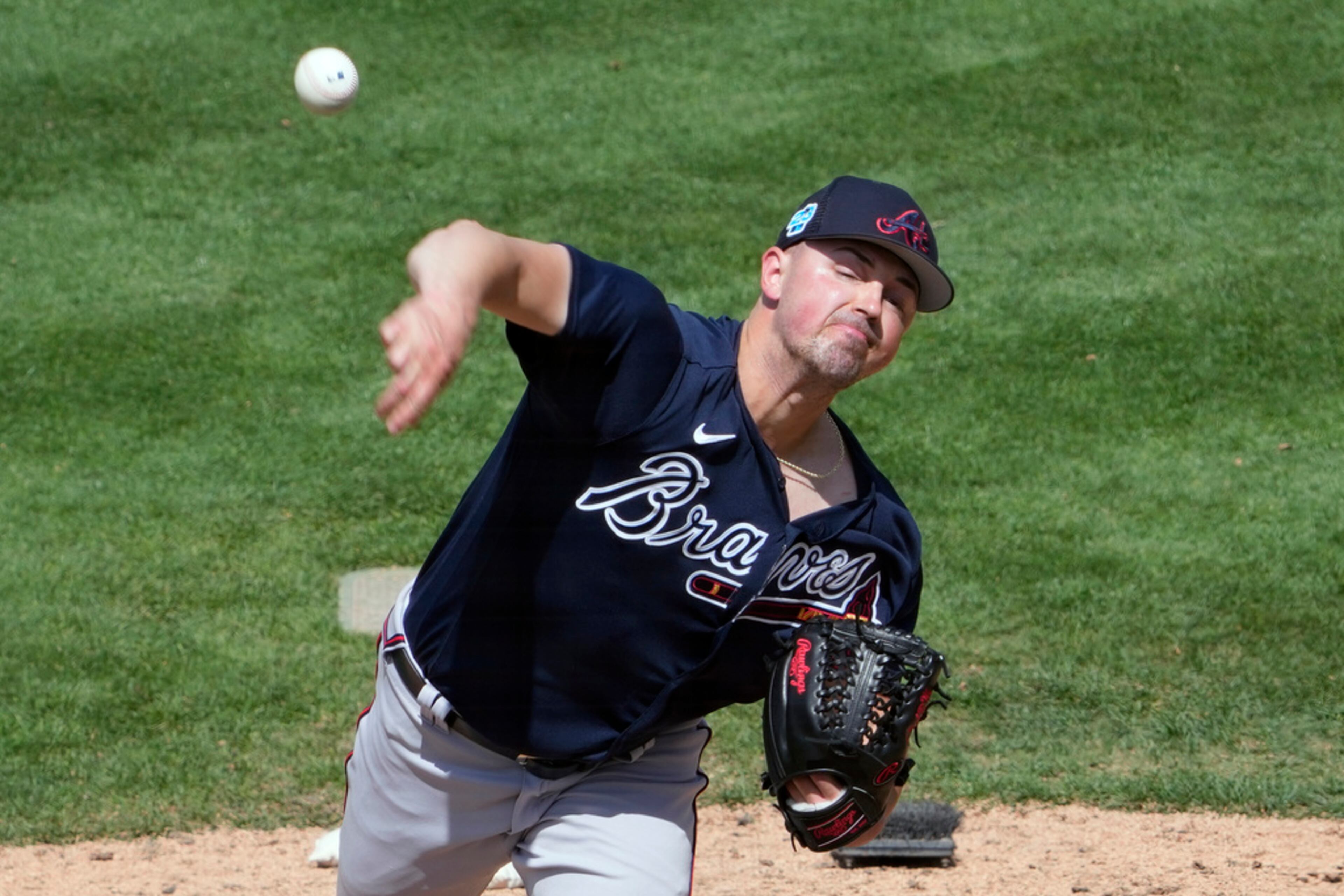 Atlanta Braves pitcher Matt Swarmer pitches against the Detroit Tigers in the sixth inning of a spring training baseball game, Wednesday, March 22, 2023, in Lakeland, Fla. (AP Photo/John Raoux)