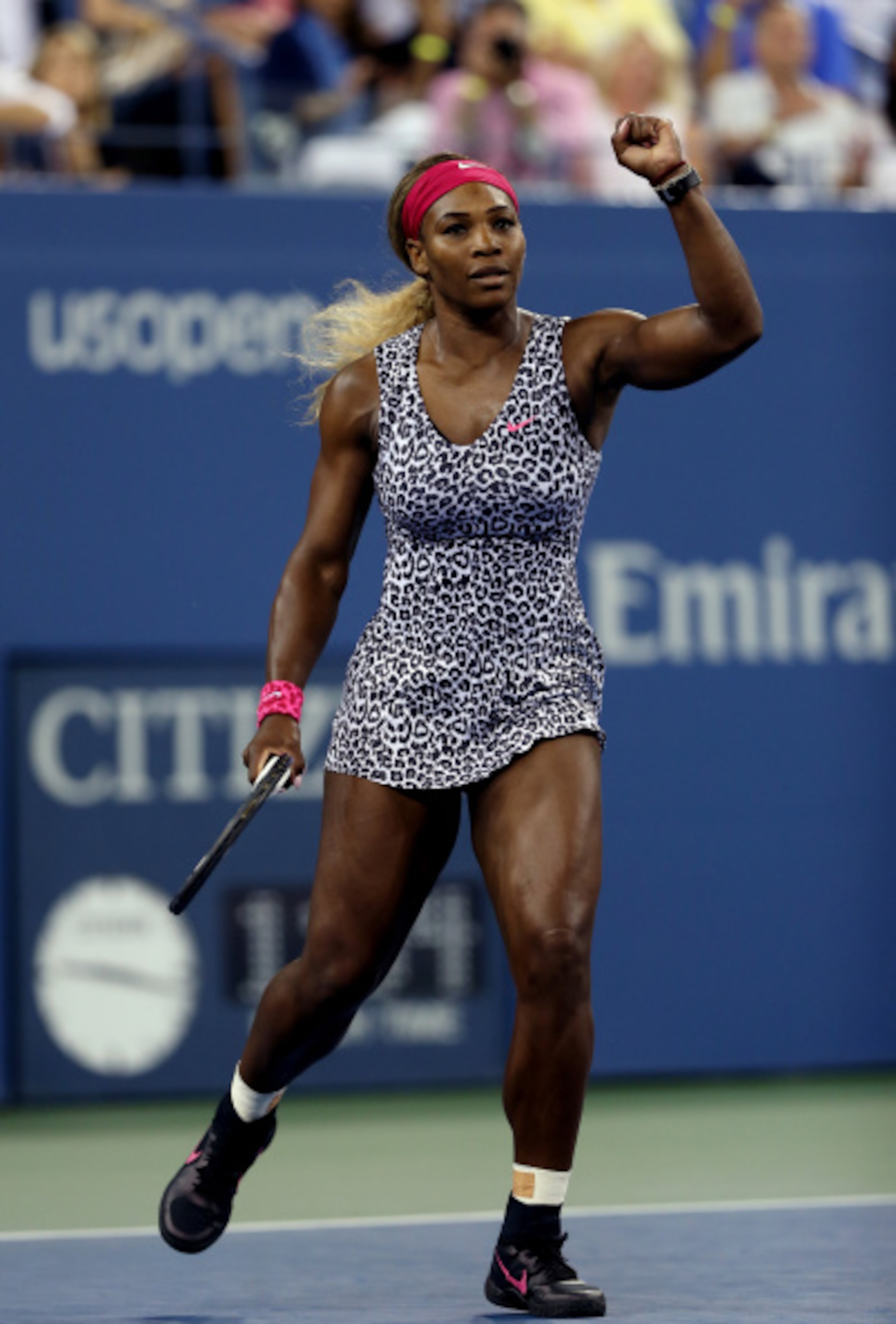 NEW YORK, NY - SEPTEMBER 03: Serena Williams of the United States celebrates match point against Flavia Pennetta of Italy in their women's singles quarterfinal match on Day Ten of the 2014 US Open at the USTA Billie Jean King National Tennis Center on September 3, 2014 in the Flushing neighborhood of the Queens borough of New York City. Williams defeated Pannetta 6-3, 6-2. (Photo by Matthew Stockman/Getty Images)