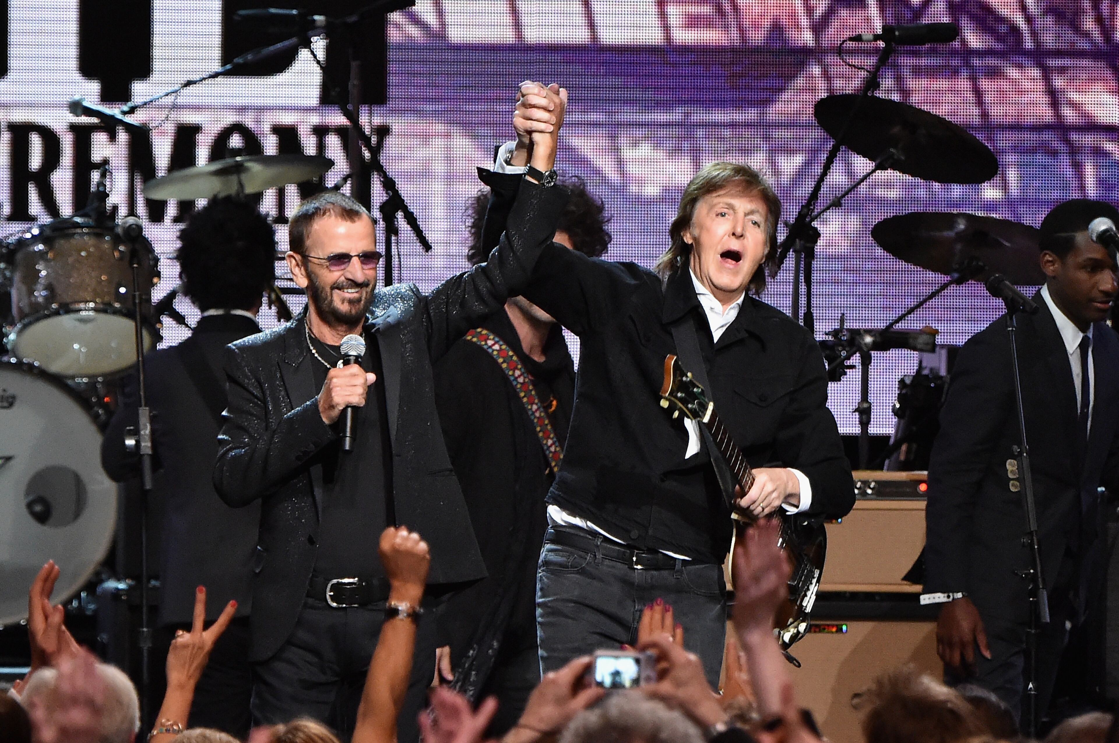 CLEVELAND, OH - APRIL 18: Sir Paul McCartney (L) and inductee Ringo Starr perform onstage during the 30th Annual Rock And Roll Hall Of Fame Induction Ceremony at Public Hall on April 18, 2015 in Cleveland, Ohio. (Photo by Mike Coppola/Getty Images)
