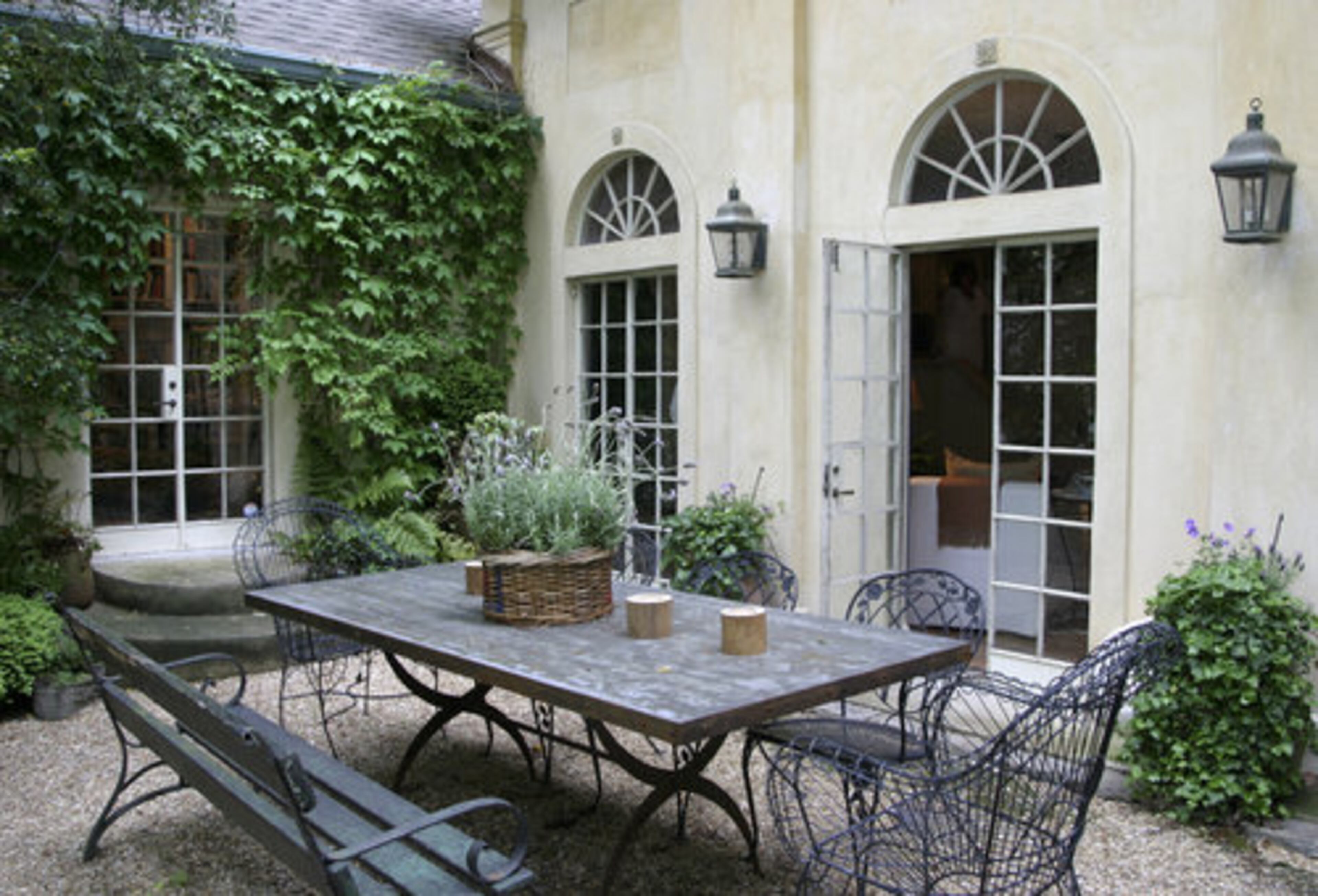 The courtyard set near the living room and within sight of the cozy kitchen is the most popular space for entertaining.