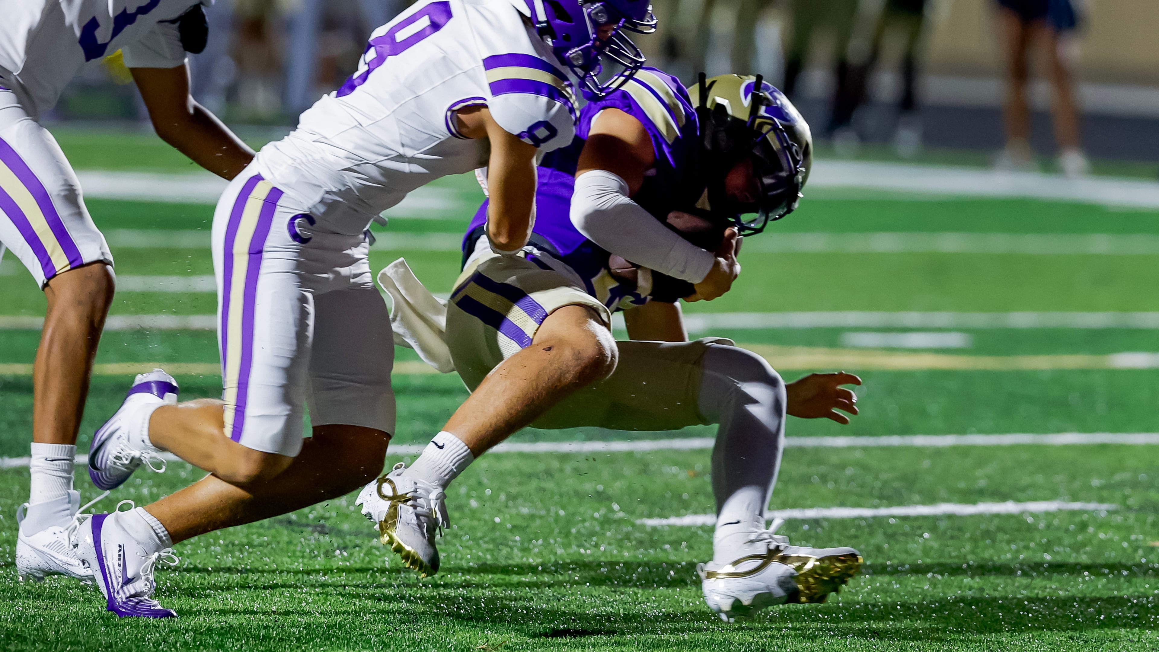 Cartersville's Easton Bonayan (8) tackles Hiram quarterback Caleb Carmichael (13) during the second half of a high school football game between Hiram and Cartersville, Friday, Aug. 21, 2026, in Hiram, Ga. (Erik S. Lesser for the AJC)