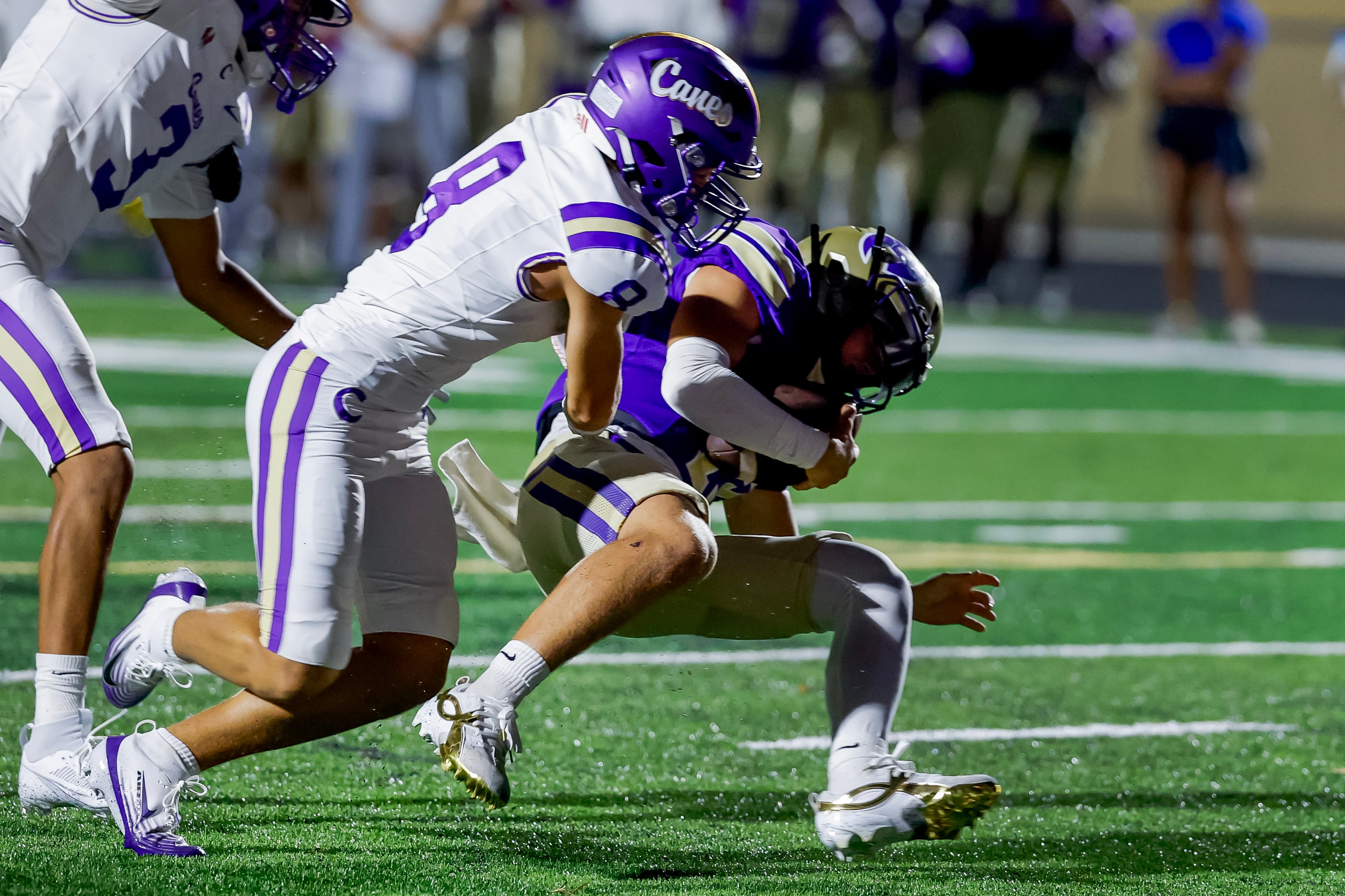 Cartersville defensive back Easton Bonayan (left) tackles Hiram quarterback Caleb Carmichael on Friday, Aug. 21, 2026, in Hiram. (Erik S. Lesser for the AJC)