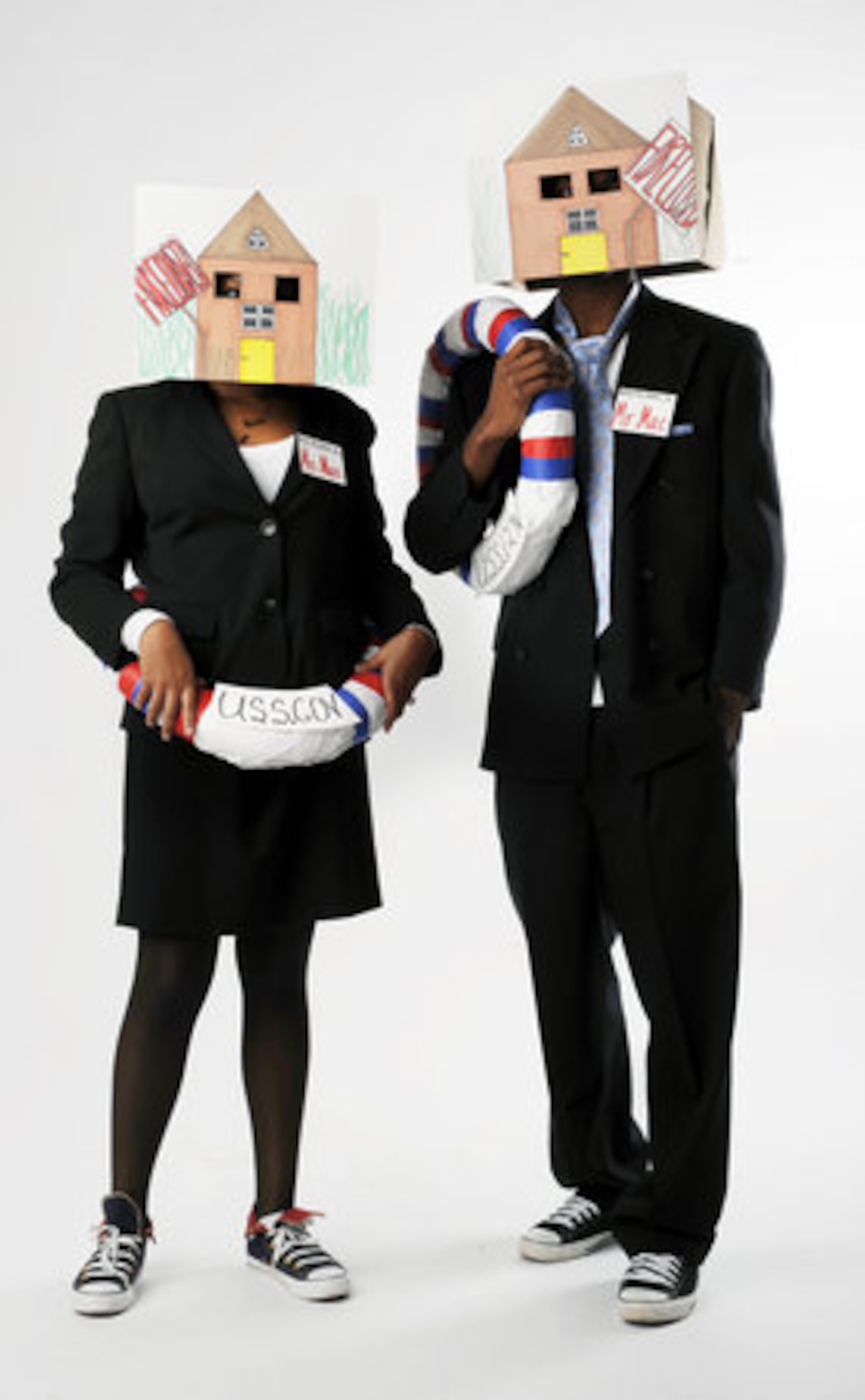 Kiara Branch and Jerromie Banks model this Fannie Mae and Freddie Mac costume designed by Lacy Tapp. All three are fashion students at Atlanta's Bauder College.