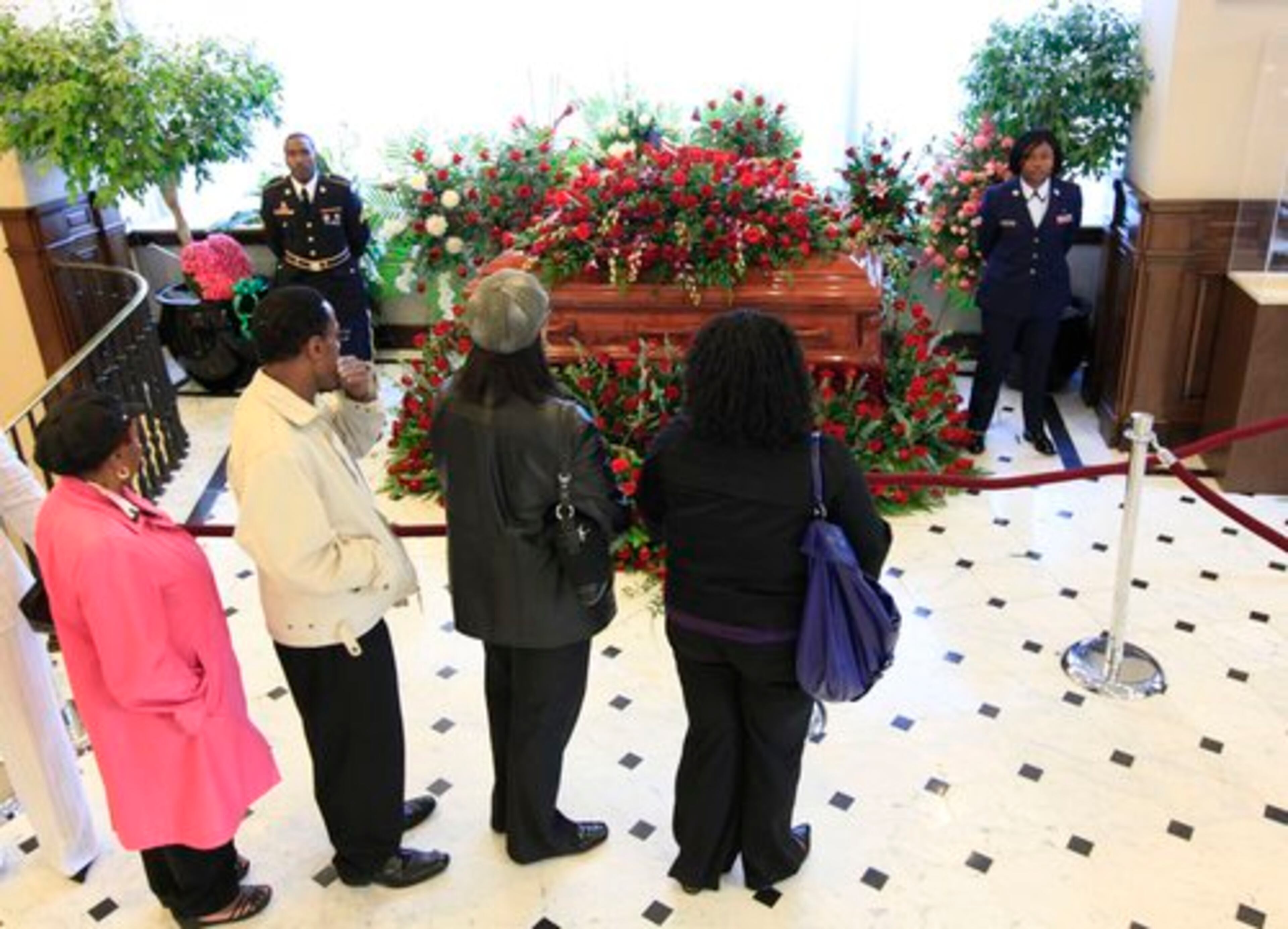 Mourners file past the casket of Dorothy Height. When she became assistant executive director of the Harlem Y.W.C.A. in the late 1930s, one of Height's first public acts was to call attention to the exploitation of black women working as domestic day laborers.