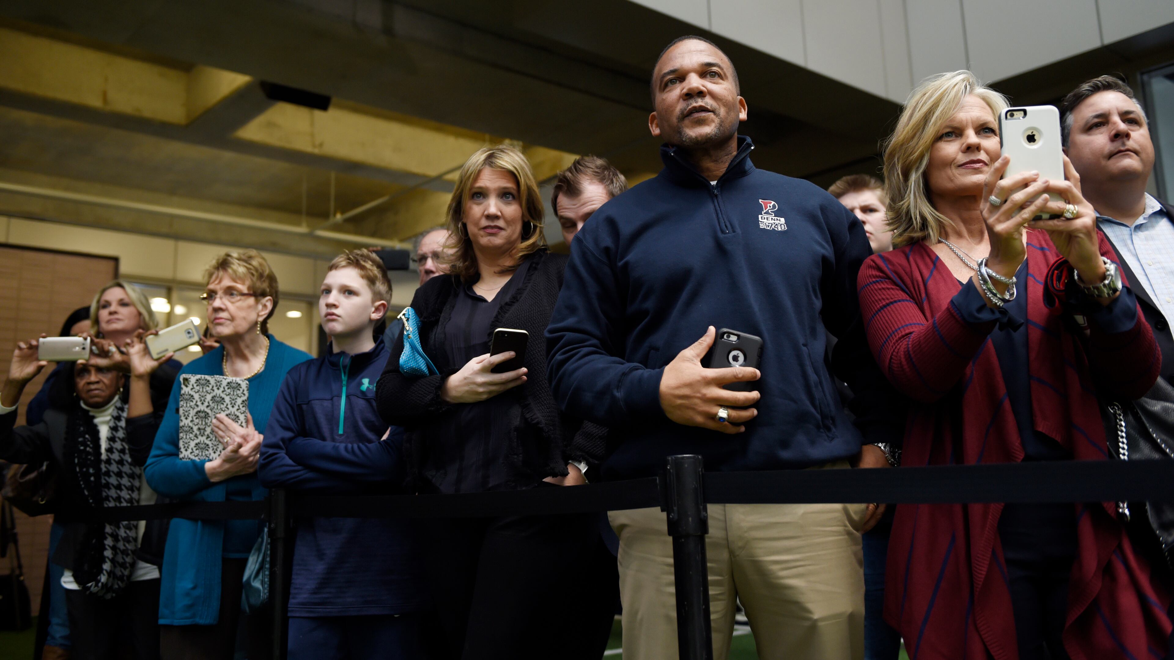 February 1, 2017, Atlanta - Fans and parents watch the National Signing Day festivities from the sidelines in Atlanta, Georgia, on Wednesday, February 1, 2017. (DAVID BARNES / DAVID.BARNES@AJC.COM)