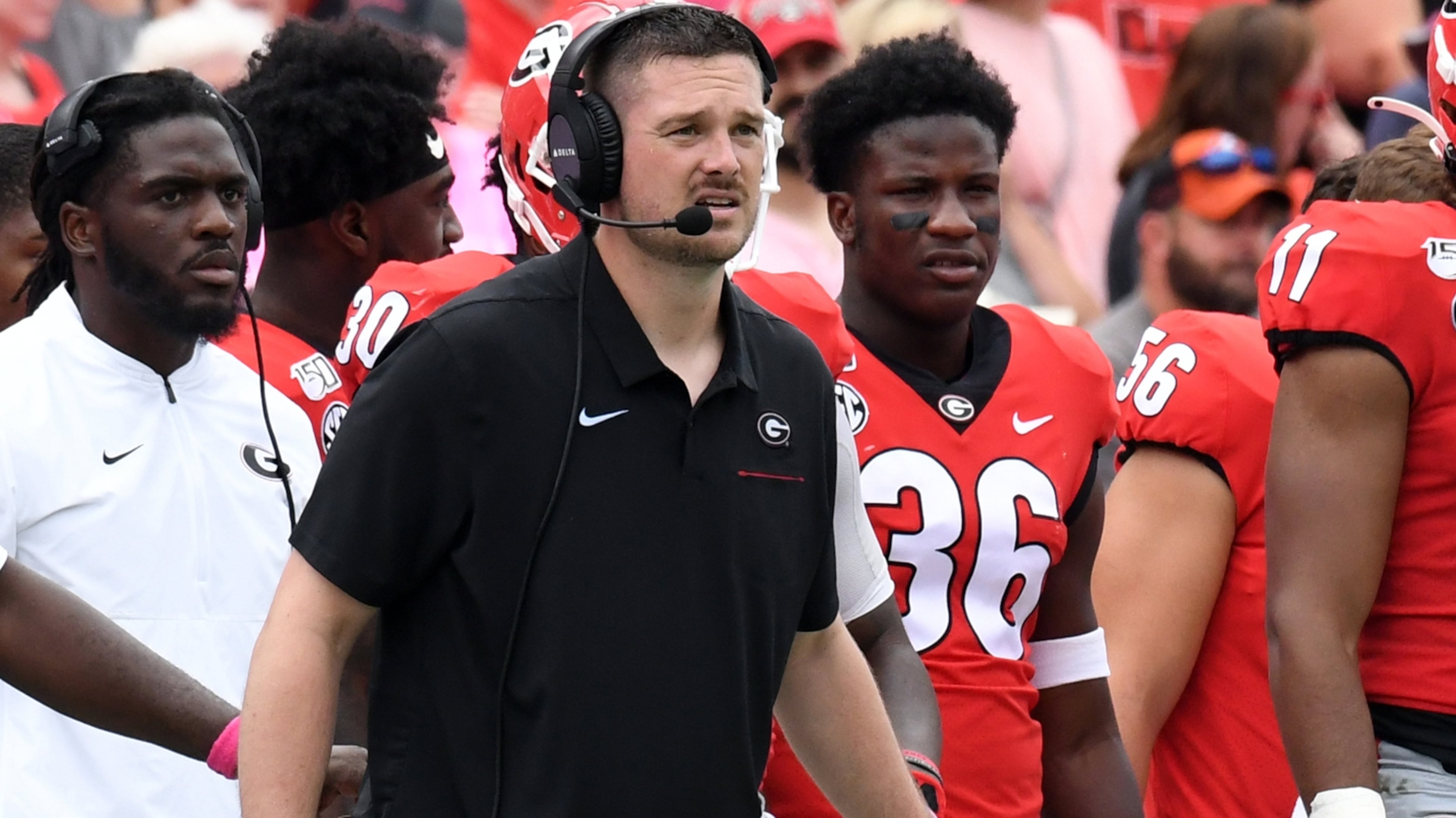Georgia defensive coordinator Dan Lanning (black shirt) is back to oversee the Bulldogs' defensive pursuits for a third season after turning down lucrative offers to leave for Florida State and Texas the past two years. (Perry McIntyre/UGA)