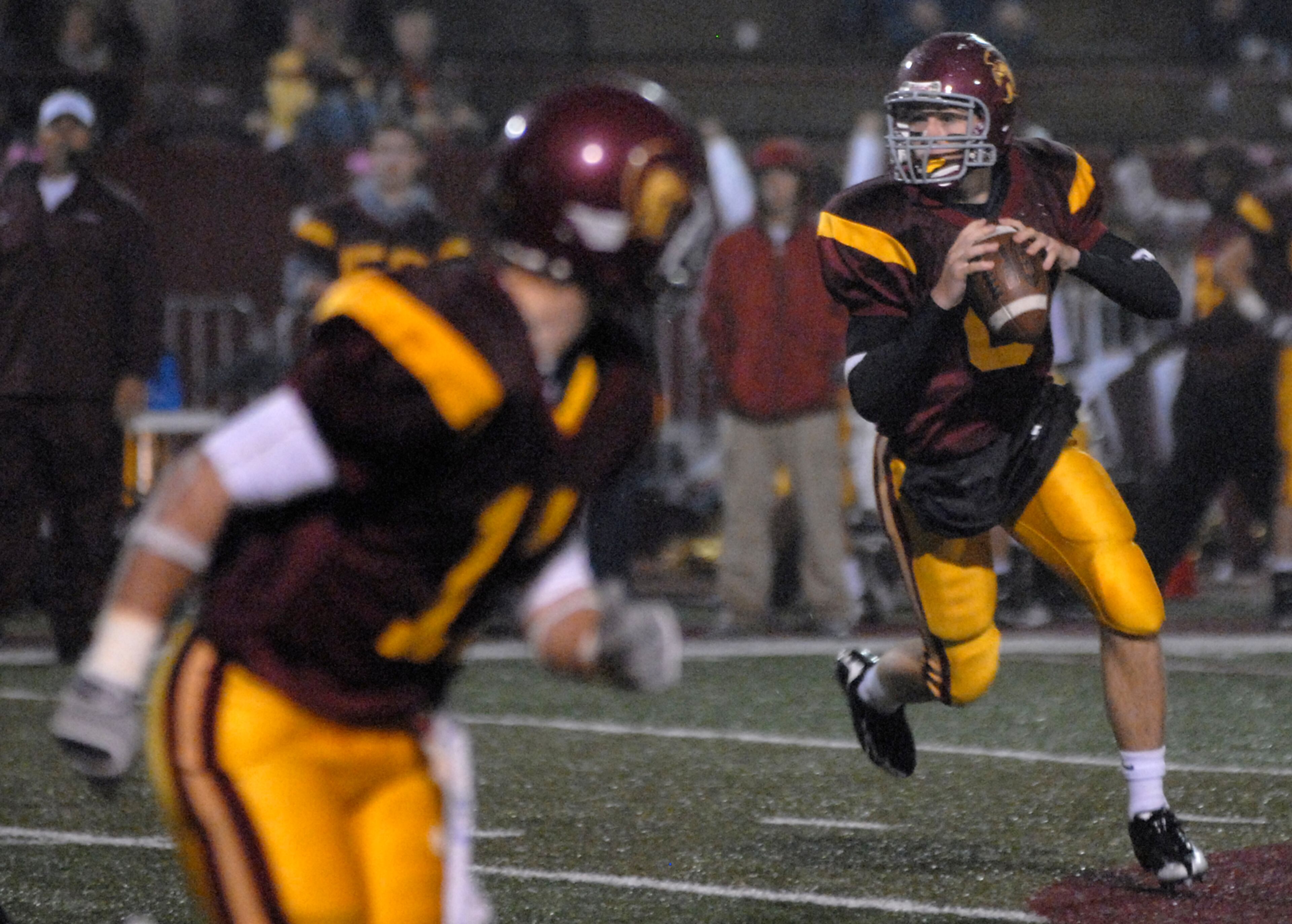 Lassiter's Hutson Mason (right) drops back against Walton.