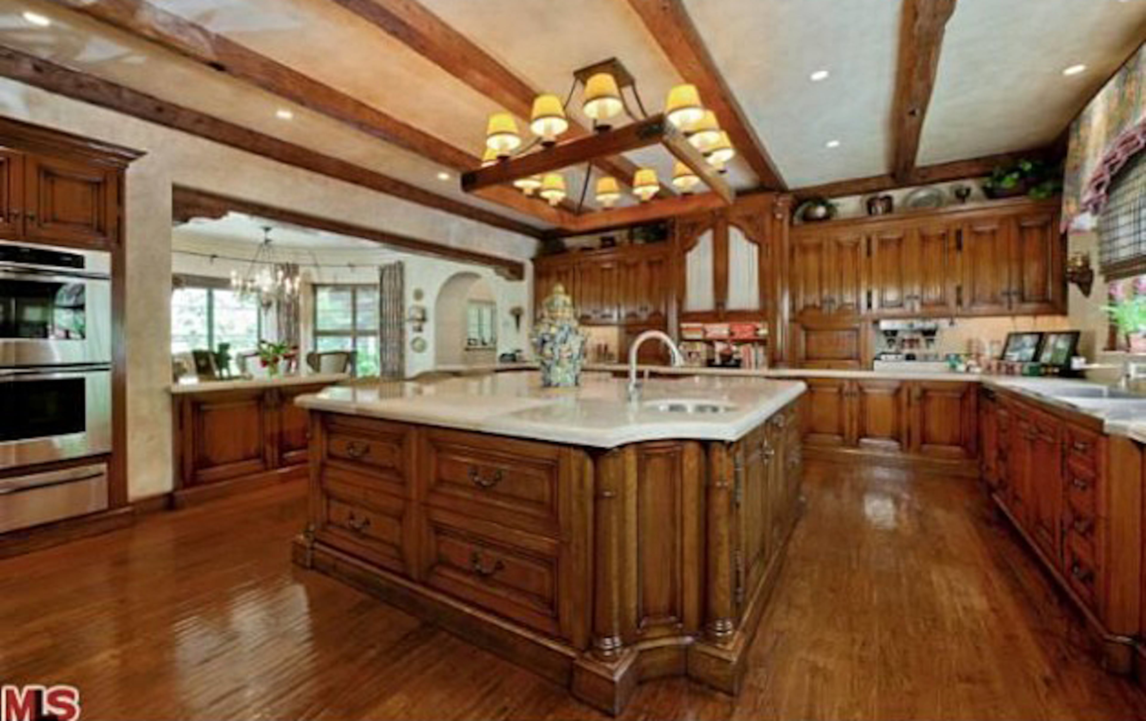 Take a peek inside Christina Aguilera's Beverly Hills mansion. The home, which Aguilera bought for $10.75 million in 2013, features six bedrooms, nine bathrooms, a master suite with a fireplace, a patio, an office, a spa bath, a screening room and wet bars. The property also includes a pool and spa. For more information, visit http://www.toptenrealestatedeals.com/homes/weekly-ten-best-home-deals/2013/5-14-2013/.