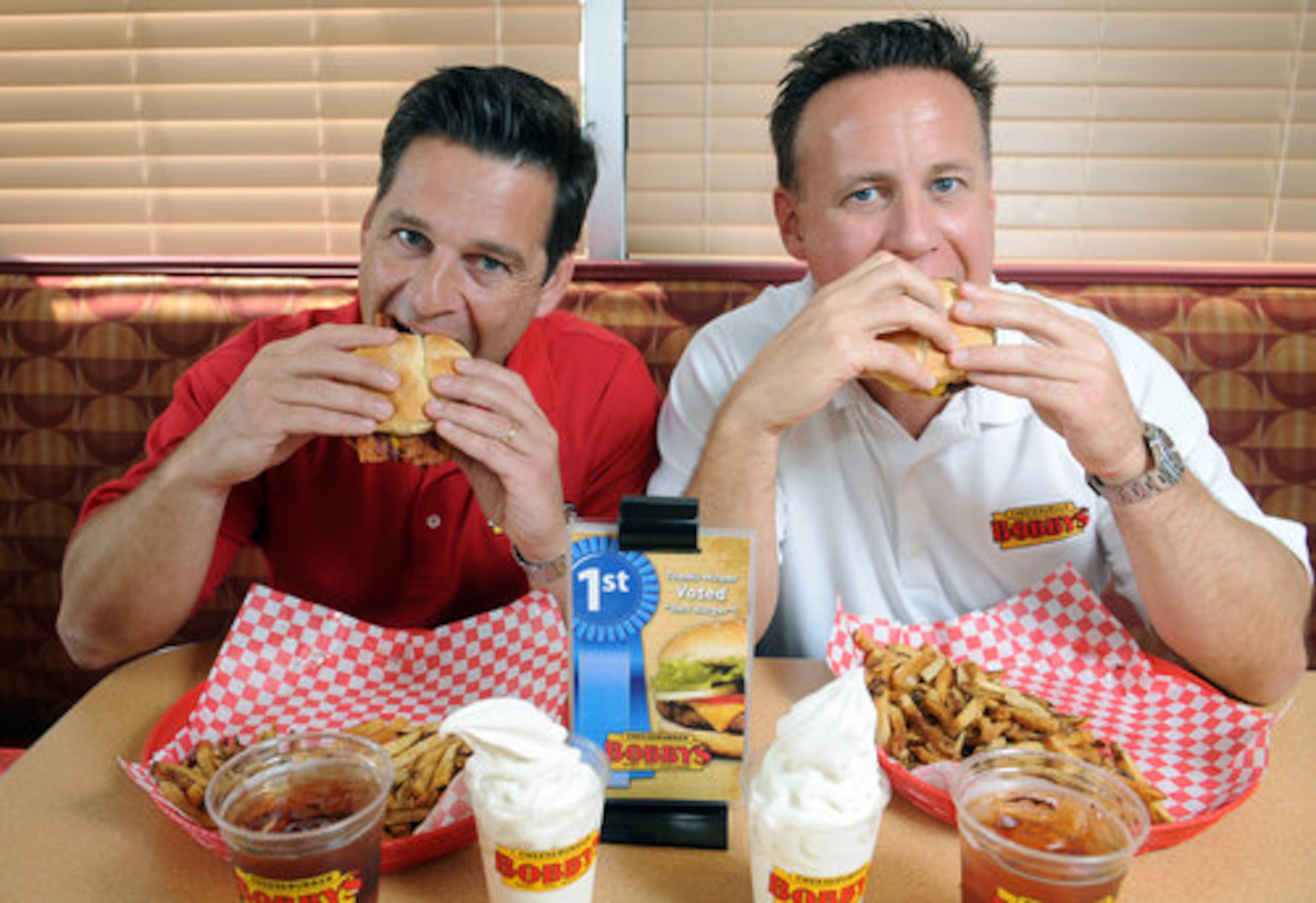 After building and then selling a 35-store pizza chain, brothers Richard (left) and Bobby Stoll have gone into the burger business. The Stolls opened their first Cheeseburger Bobby's in Hiram in August 2007.