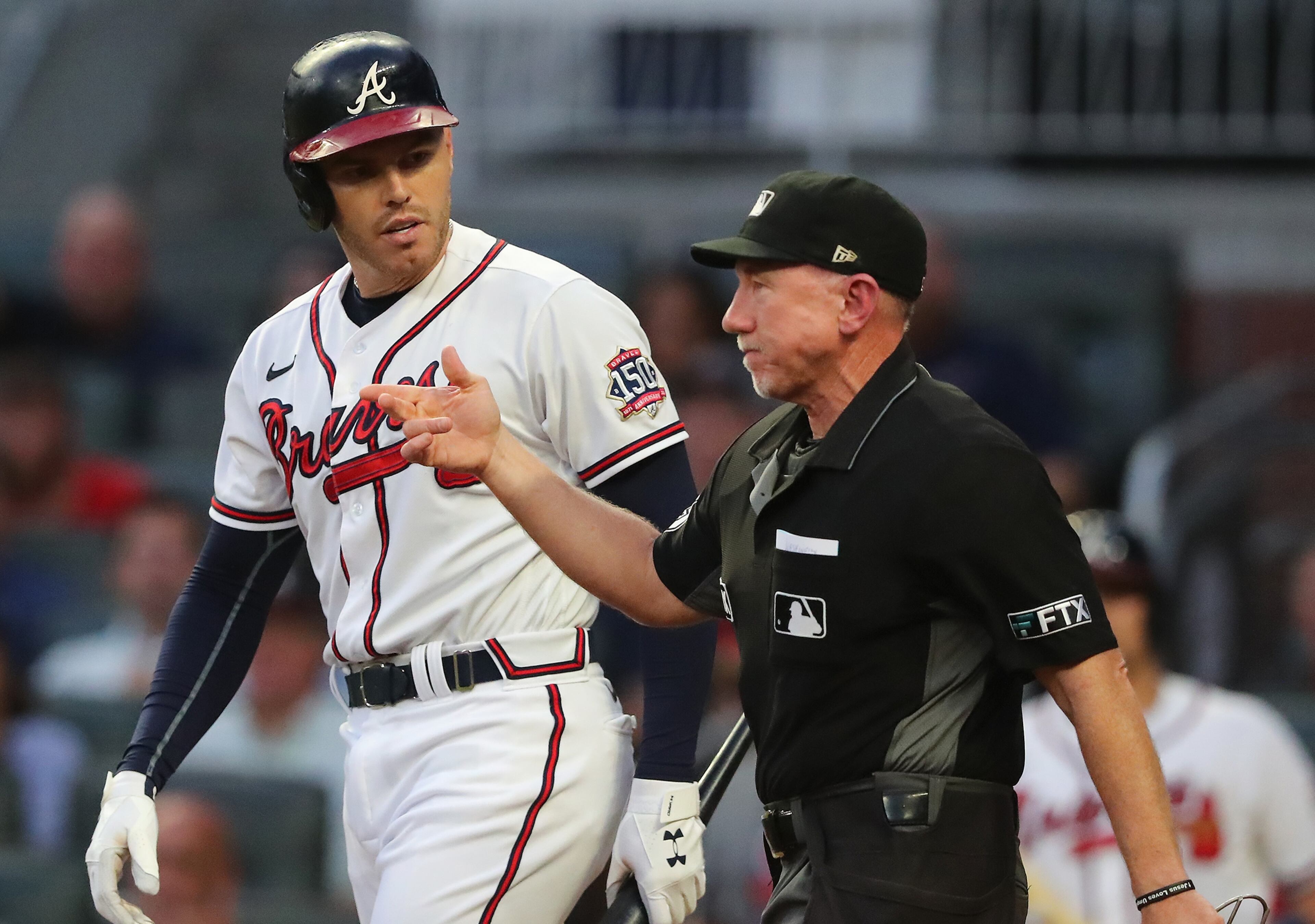 Umpire Lance Barksdale awards Freddie Freeman first base after he was hit by a pitch in the first inning Wednesday. Washington Nationals starting pitcher Sean Nolin was ejected from the game after his second consecutive pitch at Freeman. The Nationals apparently were retaliating for the Braves hitting their star Juan Soto with a pitch Tuesday night. “Curtis Compton / Curtis.Compton@ajc.com”