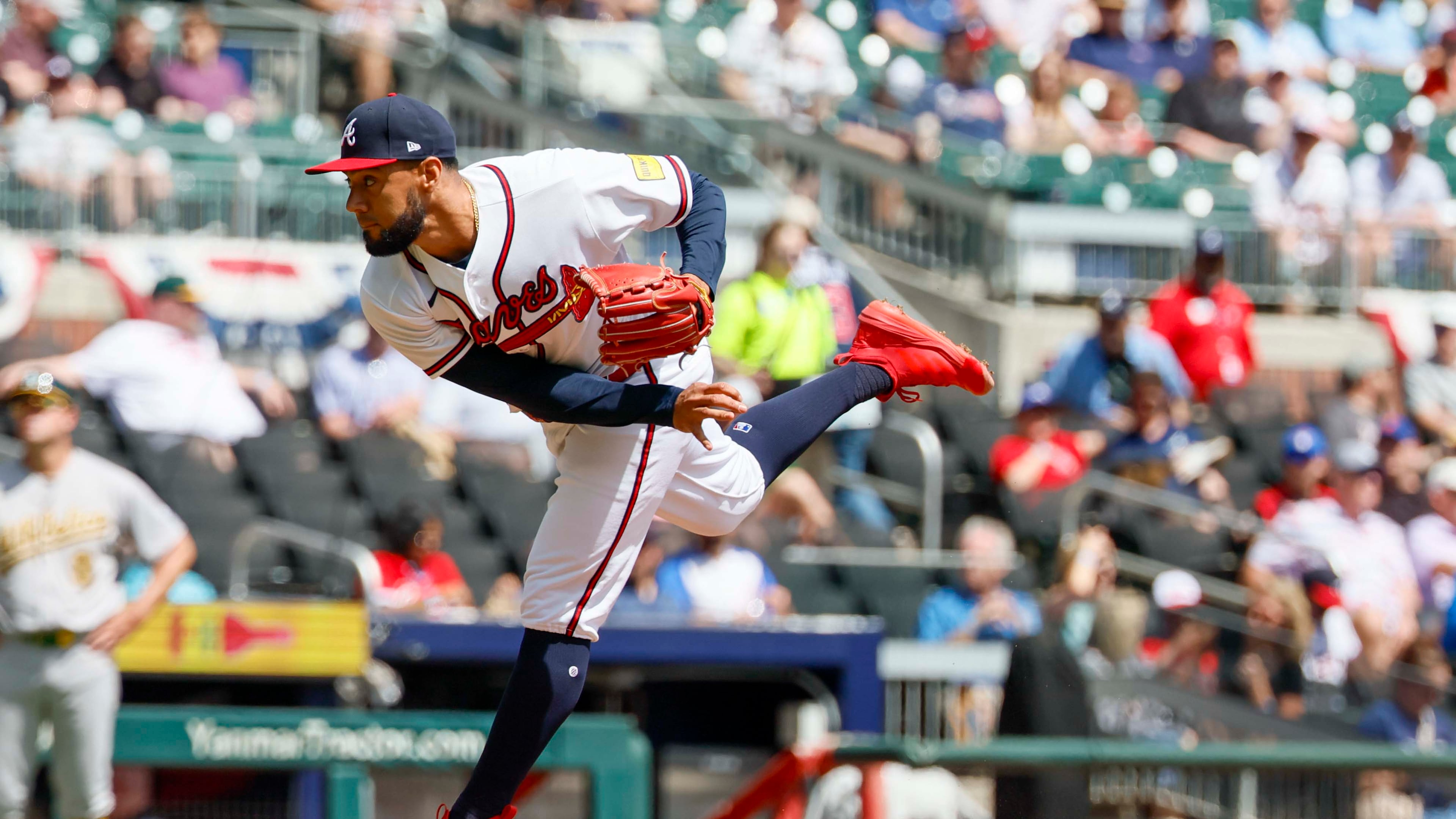 Atlanta Braves pitcher Robert Suarez delivers to an Athletics batter during the sixth inning at Truist Park on Wednesday, April 1, 2026. (Miguel Martinez/AJC)