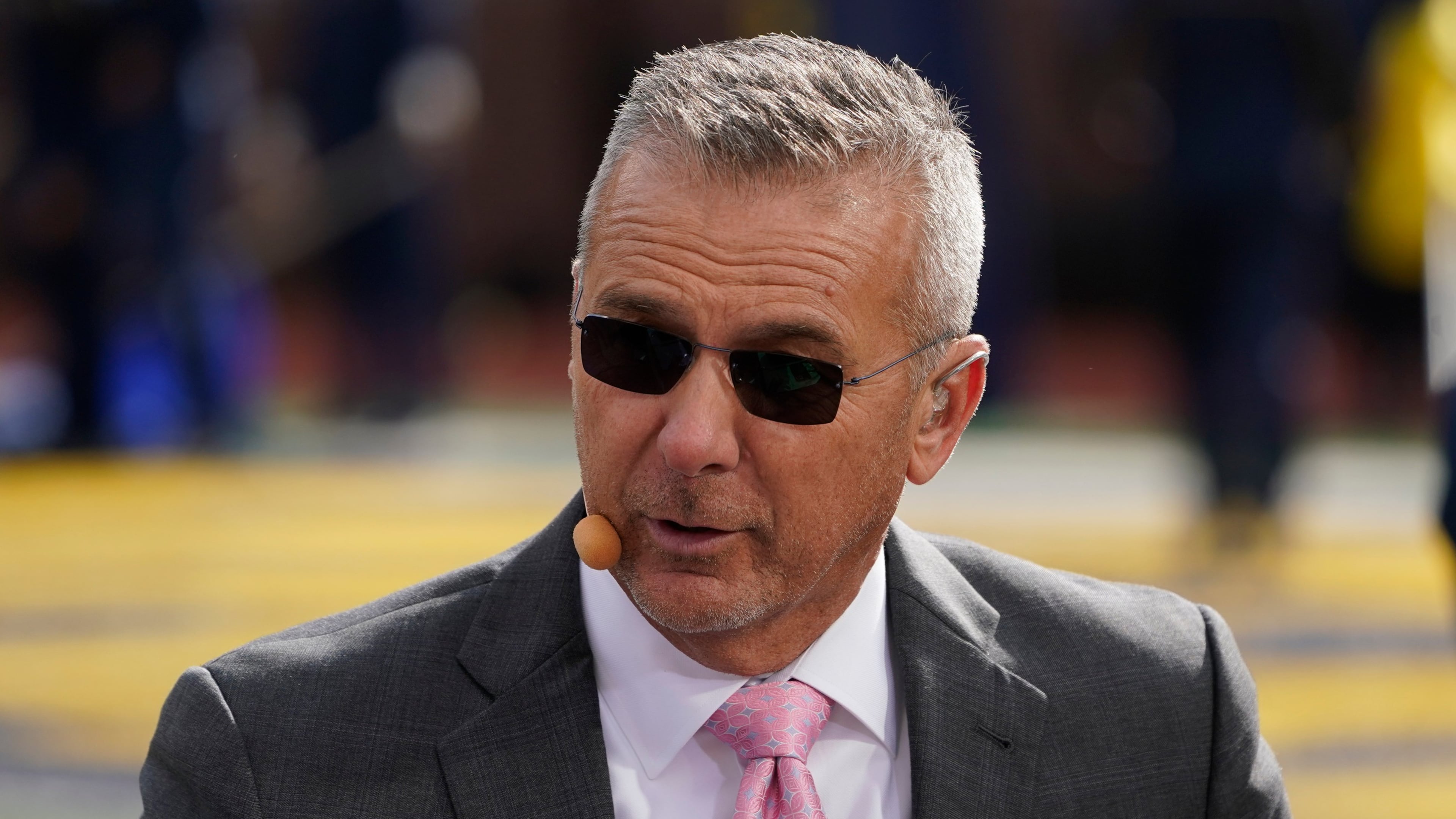 FILE - Urban Meyer, a FOX Sports college football analyst, appears before an NCAA college football game between Michigan and Penn State in Ann Arbor, Mich., Oct. 15, 2022. (AP Photo/Paul Sancya, File)