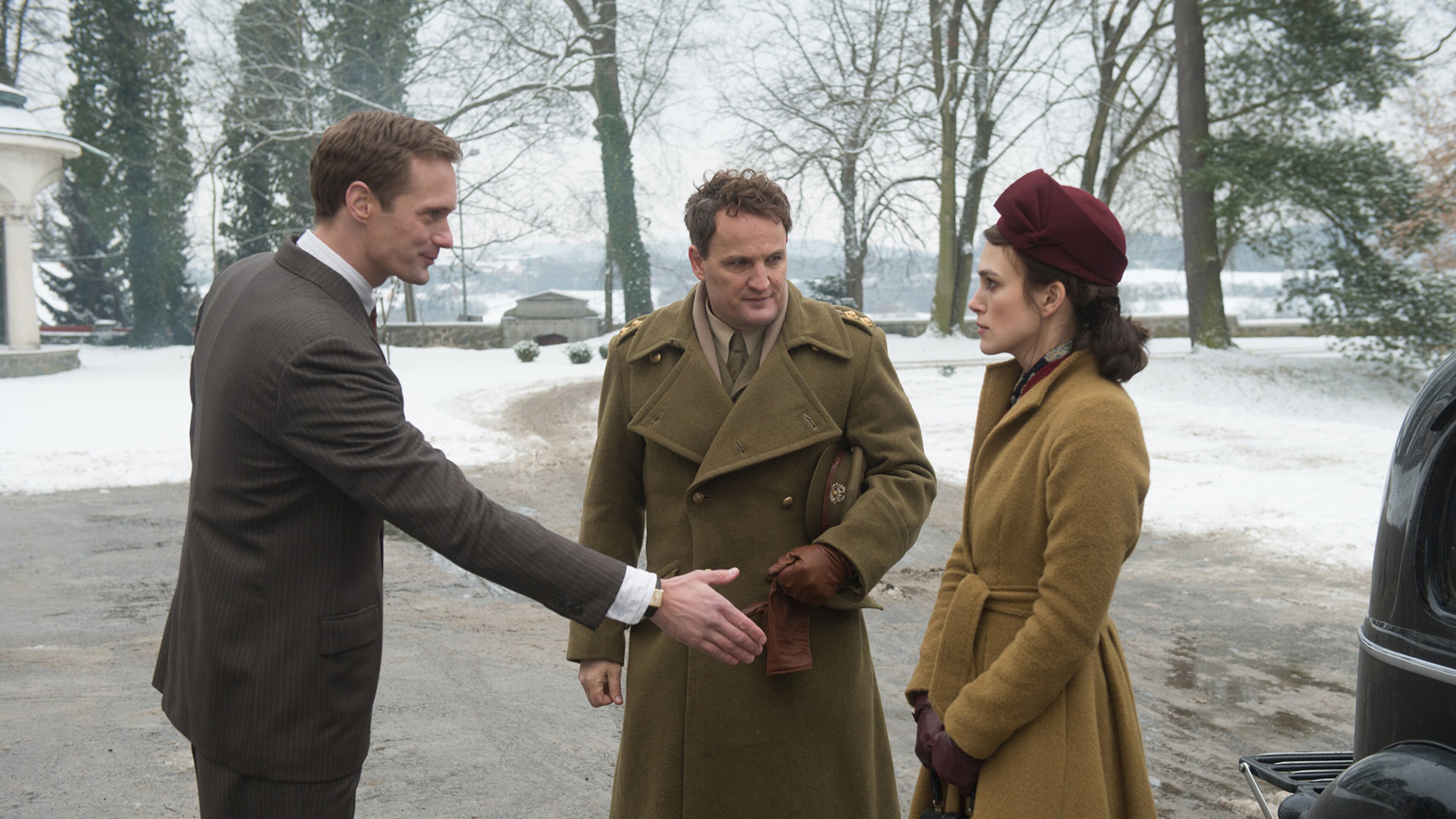 Alexander Skarsgard (from left), Jason Clarke and Keira Knightley star in “The Aftermath,” a romantic potboiler set in post-World War II Hamburg. David Appleby, Fox Searchlight Pictures