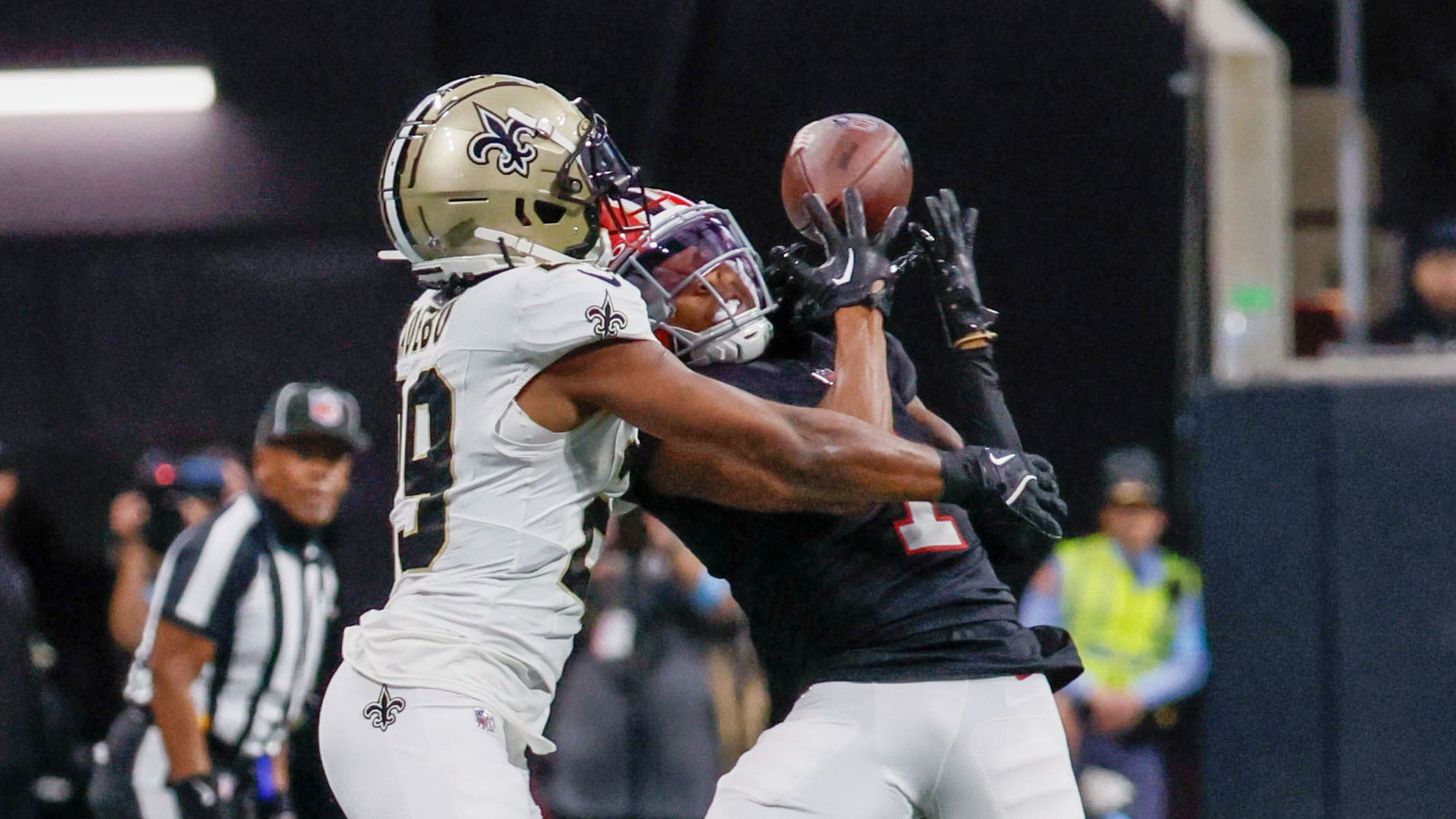 Atlanta Falcons wide receiver Darnell Mooney (1) attempts a catch as the New Orleans Saints cornerback Paulson Adebo (29) was called pass interference during the second half of an NFL football game against the New Orleans Saints on Sunday, Sept. 29, at Mercedes-Benz Stadium in Atlanta.
(Miguel Martinez/ AJC)