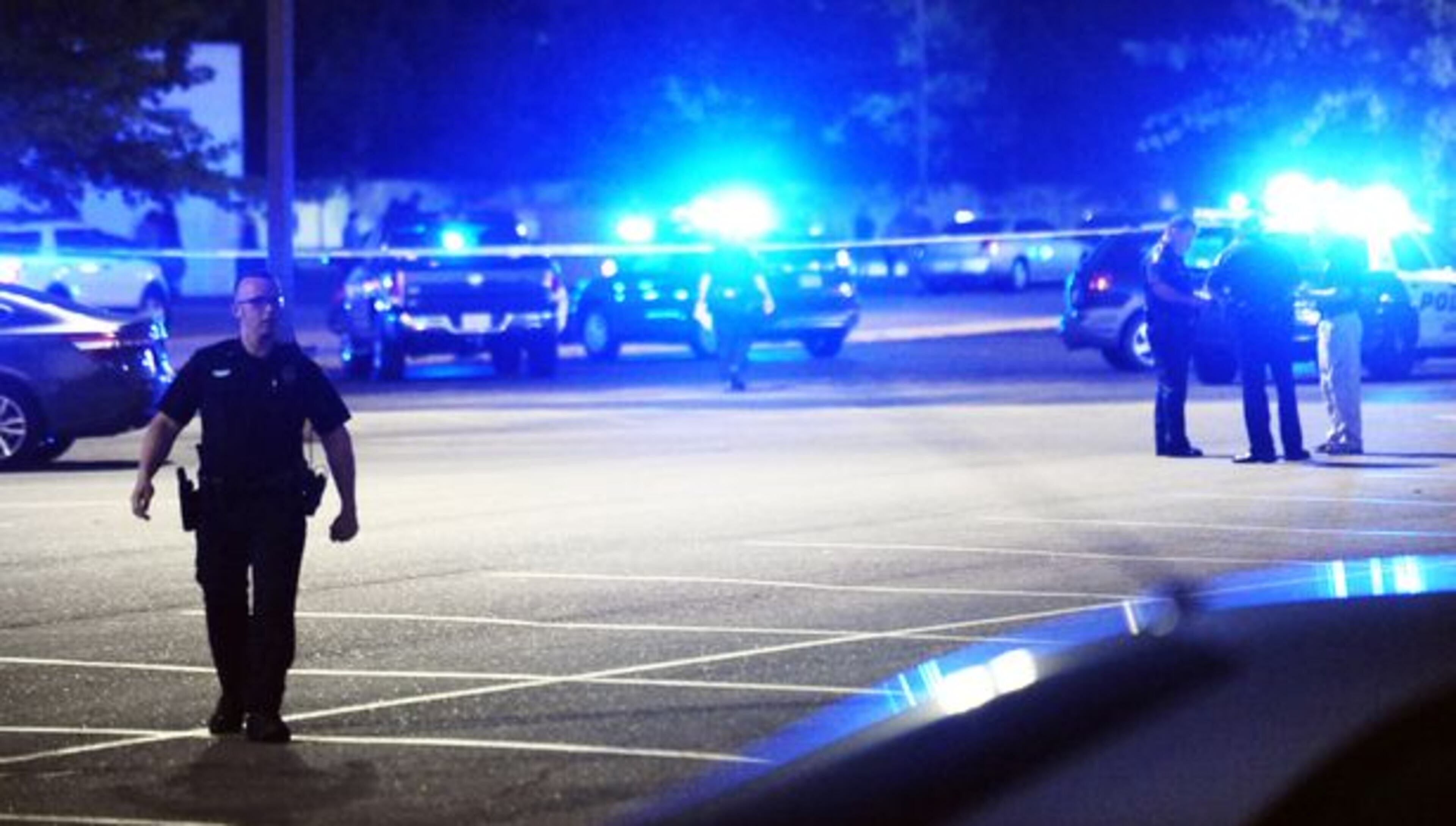 Police surround the scene following a shooting at a movie theater Thursday, July 23, 2015, in Lafayette, La. (AP)