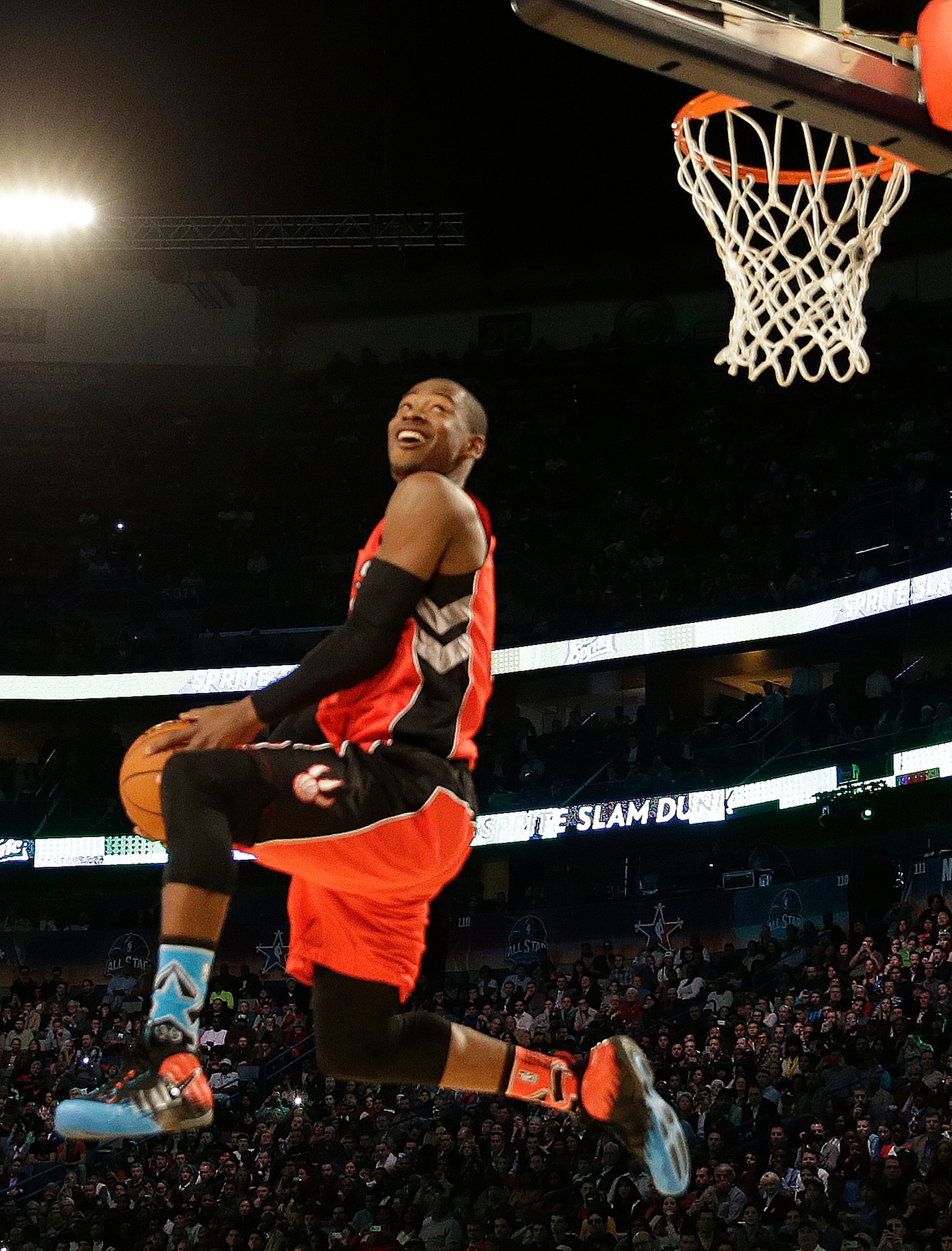 Terrence Ross of the Toronto Raptors participates in the slam dunk contest during the skills competition at the NBA All Star basketball game, Saturday, Feb. 15, 2014, in New Orleans. (AP Photo/Gerald Herbert)