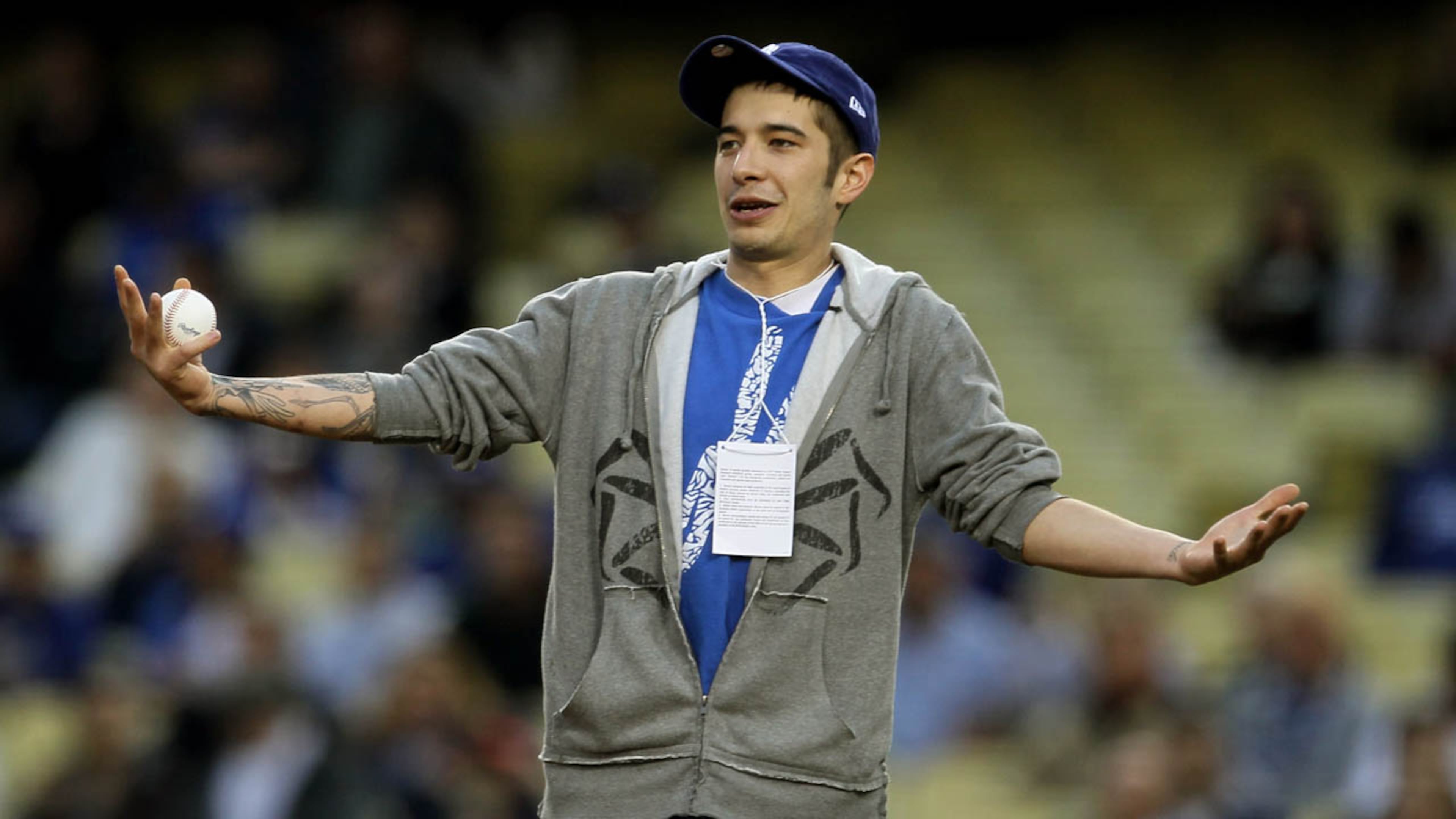 Jake Harris of the reality TV show Deadliest Catch hams it up before throwing out the ceremonial first pitch before the game between the Atlanta Braves and the Los Angeles Dodgers on April 18, 2011 at Dodger Stadium in Los Angeles, California.