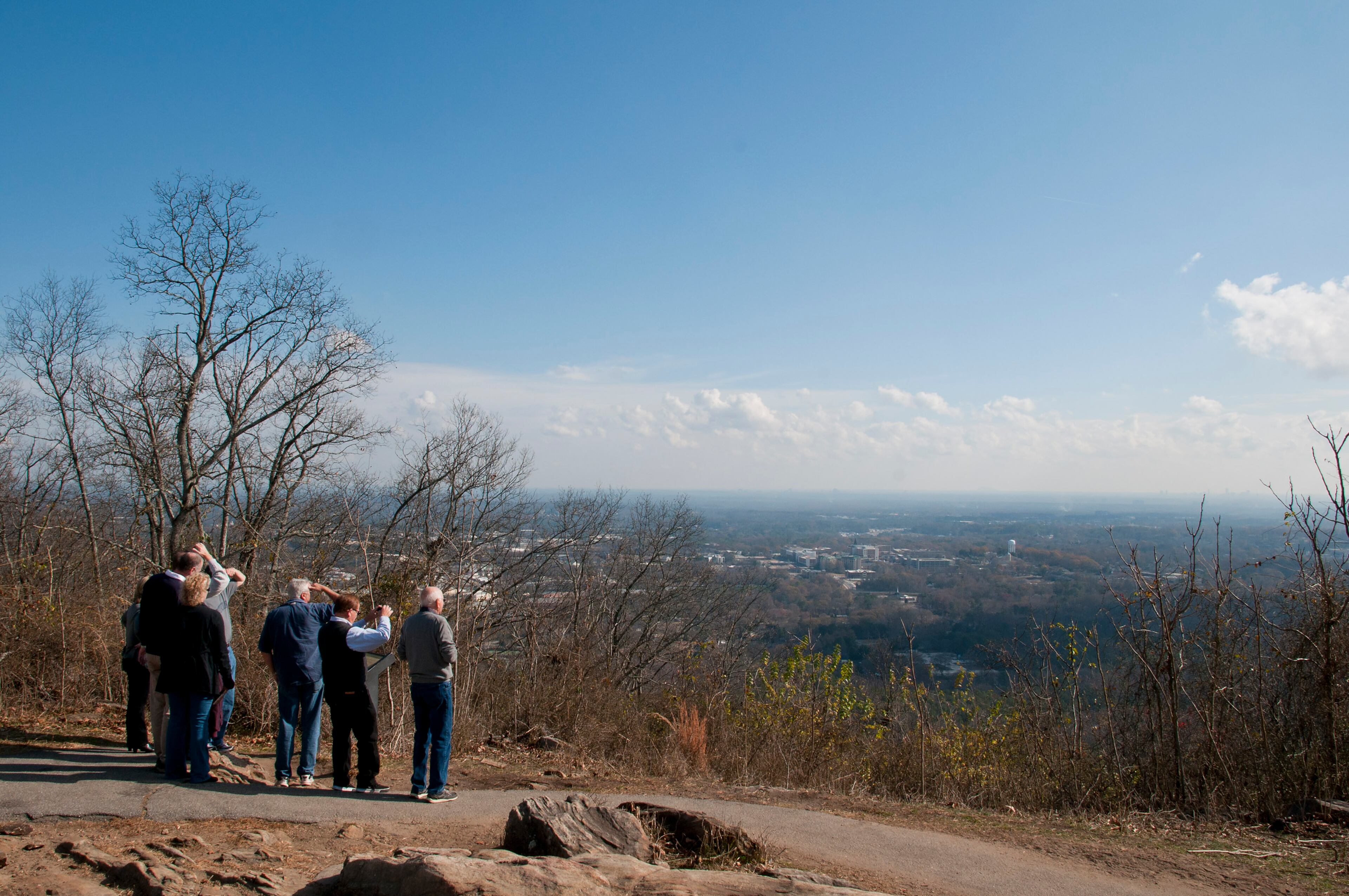 A group of tourists visiting the Kennesaw Mountain National Battlefield Park, looks east over the battlefield Saturday, December 1, 2012 in Kennesaw.