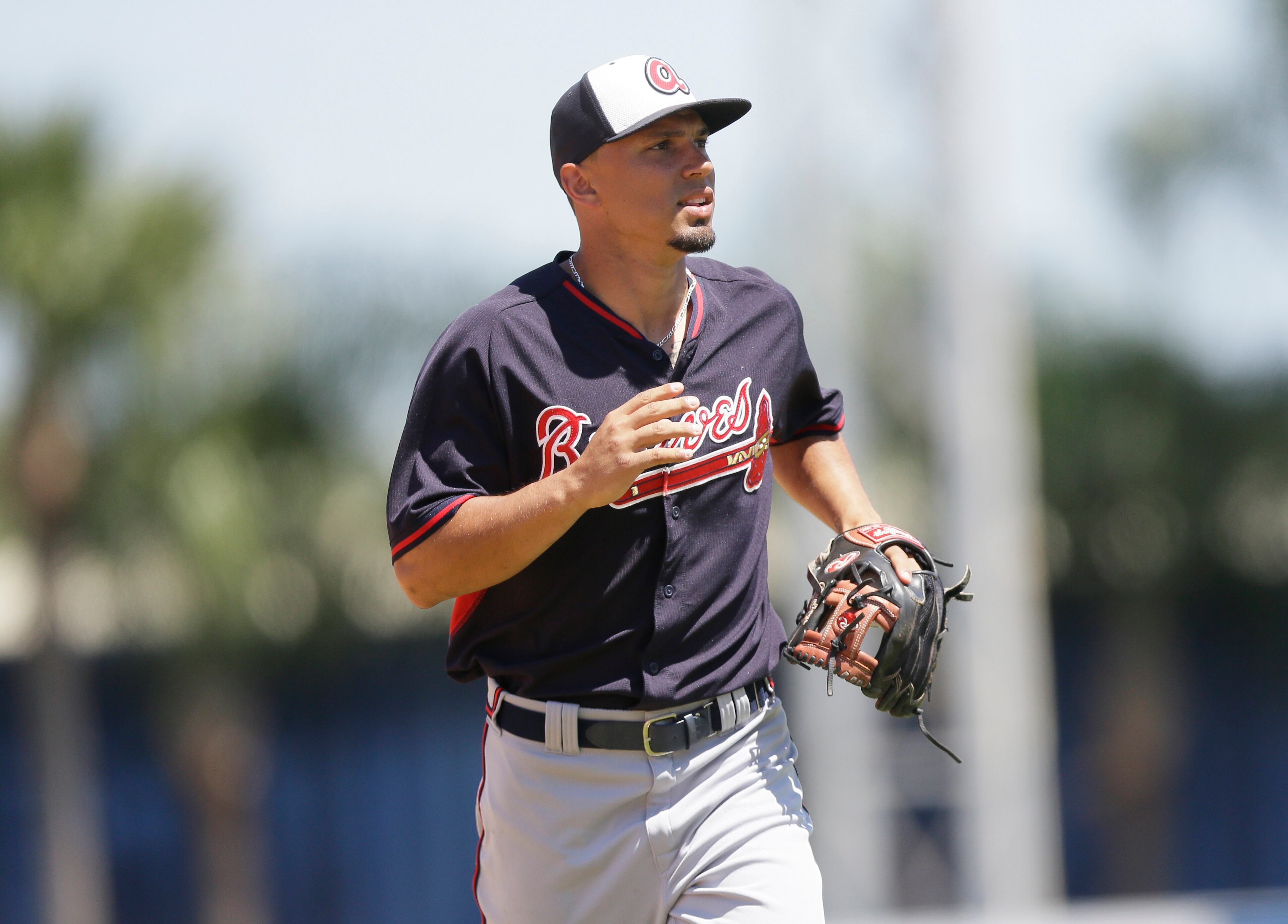 Atlanta Braves shortstop Andrelton Simmons runs to the dugout during a spring training exhibition baseball game against the Detroit Tigers in Lakeland, Fla., Monday, March 30, 2015. (AP Photo/Carlos Osorio)