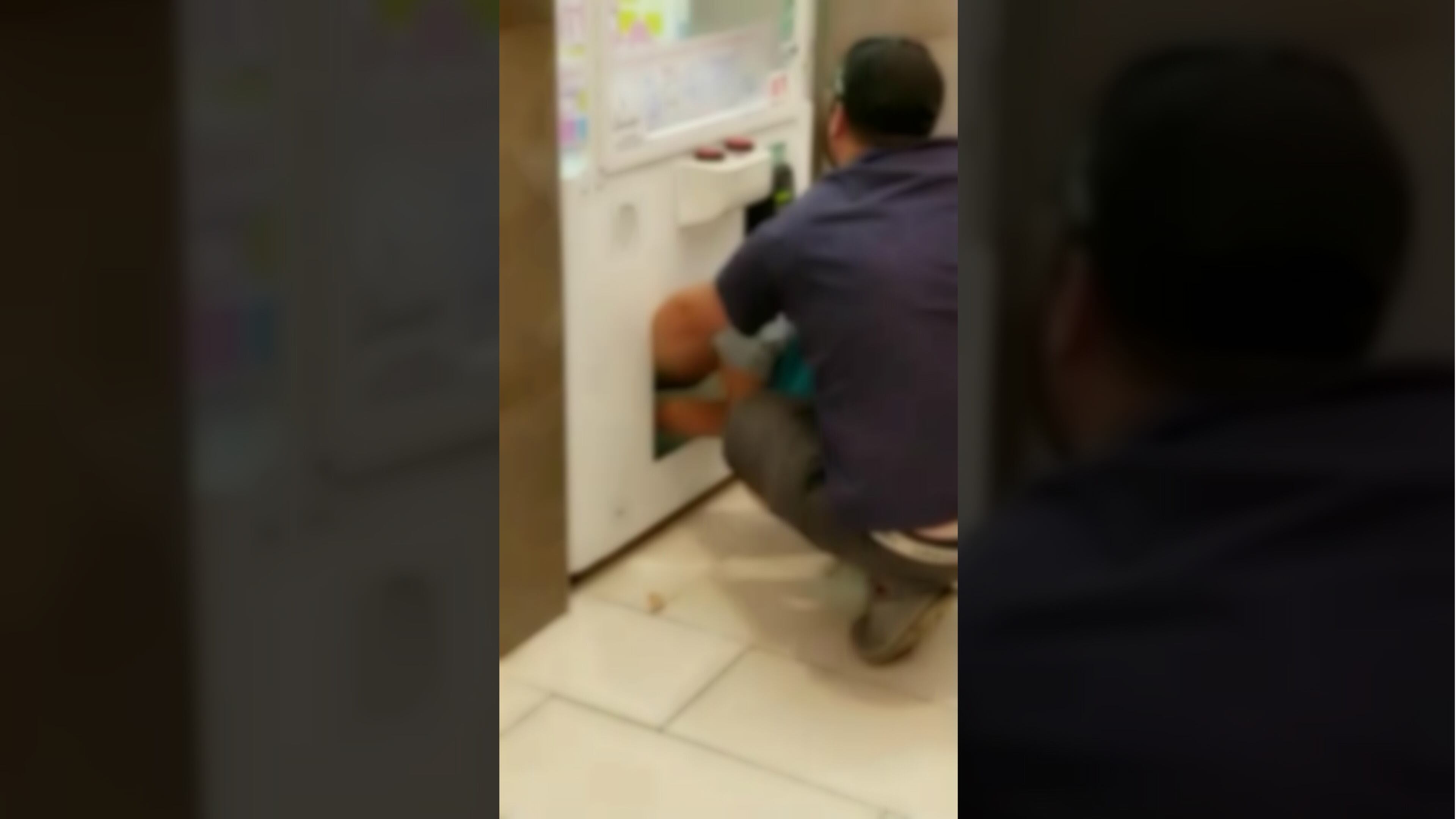 Police in Salem, New Hampshire, asked the public for help identifying a man seen on Friday, Sept. 14, 2018, using a toddler to steal items from a vending machine game at The Mall at Rockingham Park.