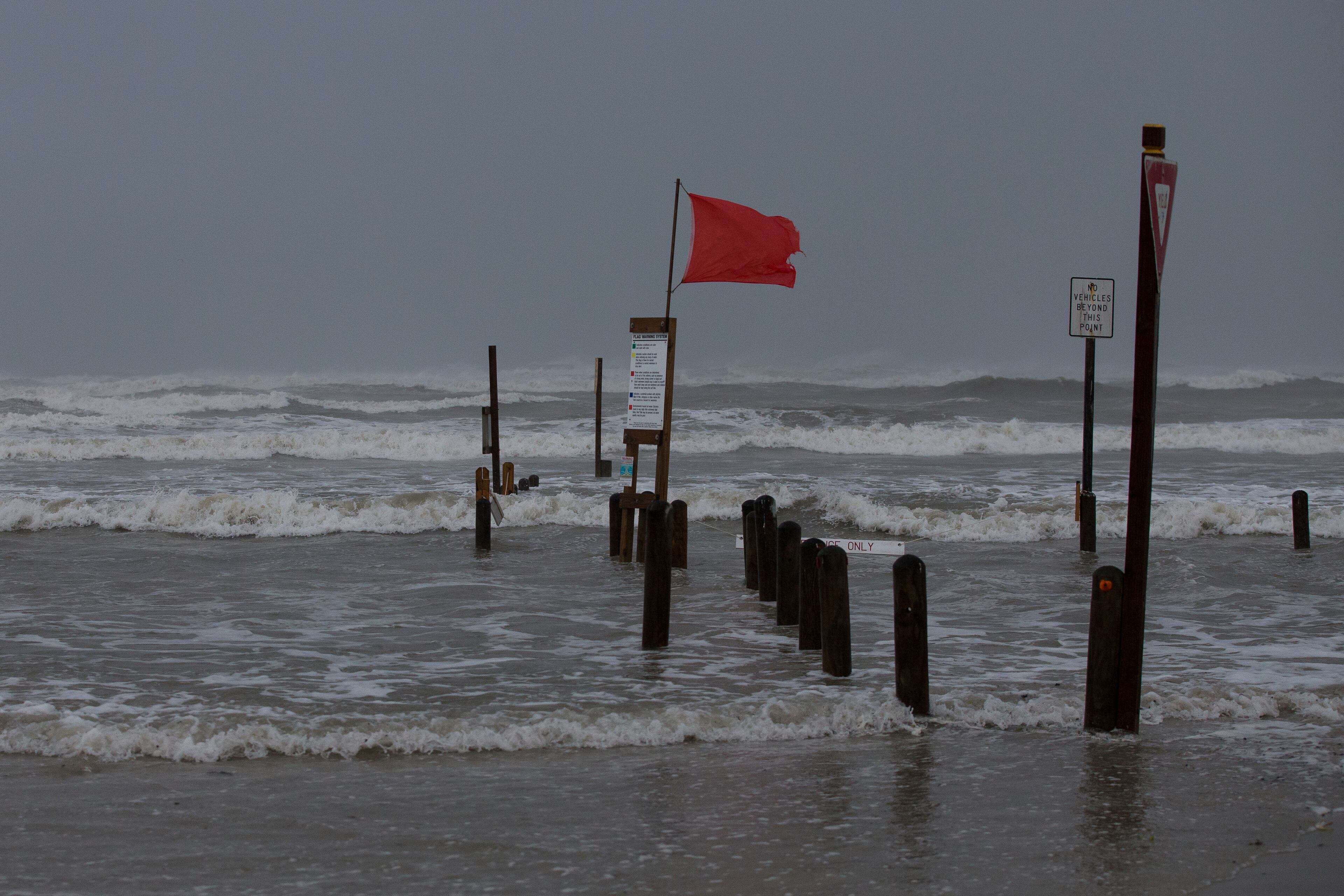 Water rises at Bob Hall Pier in Corpus Christi, Texas as Hurricane Harvey approaches on Friday, Aug. 25, 2017. The slow-moving hurricane could be the fiercest such storm to hit the United States in almost a dozen years. Forecasters labeled Harvey a "life-threatening storm" that posed a "grave risk" as millions of people braced for a prolonged battering. (Courtney Sacco/Corpus Christi Caller-Times via AP)