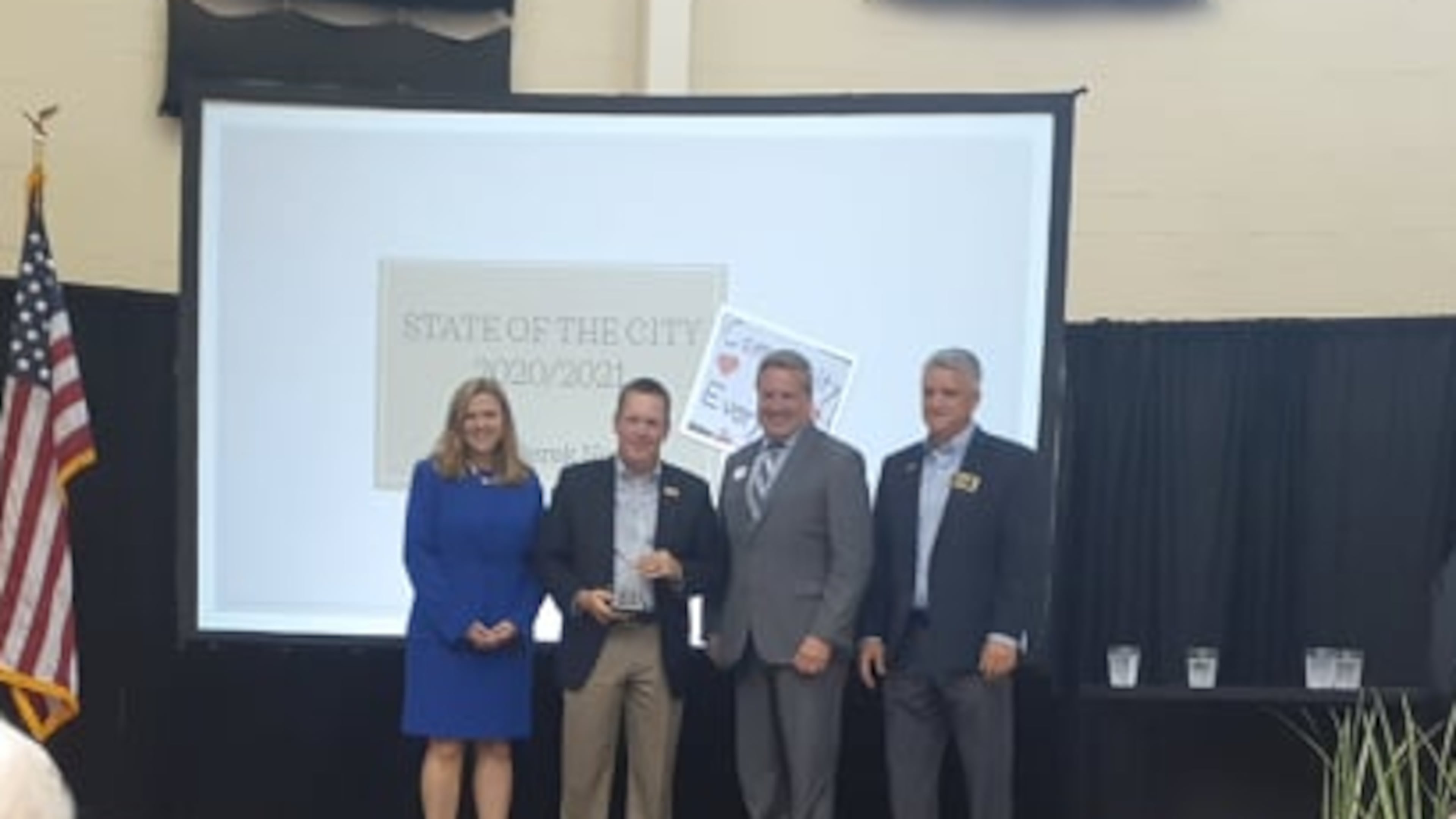 Smyrna Mayor Derek Norton, second from left, was named the 2020 Citizen of the Year by the Cobb Chamber. Norton delivered his inaugural State of the City on Wednesday night. (Photo by Matt Bruce/for the AJC)