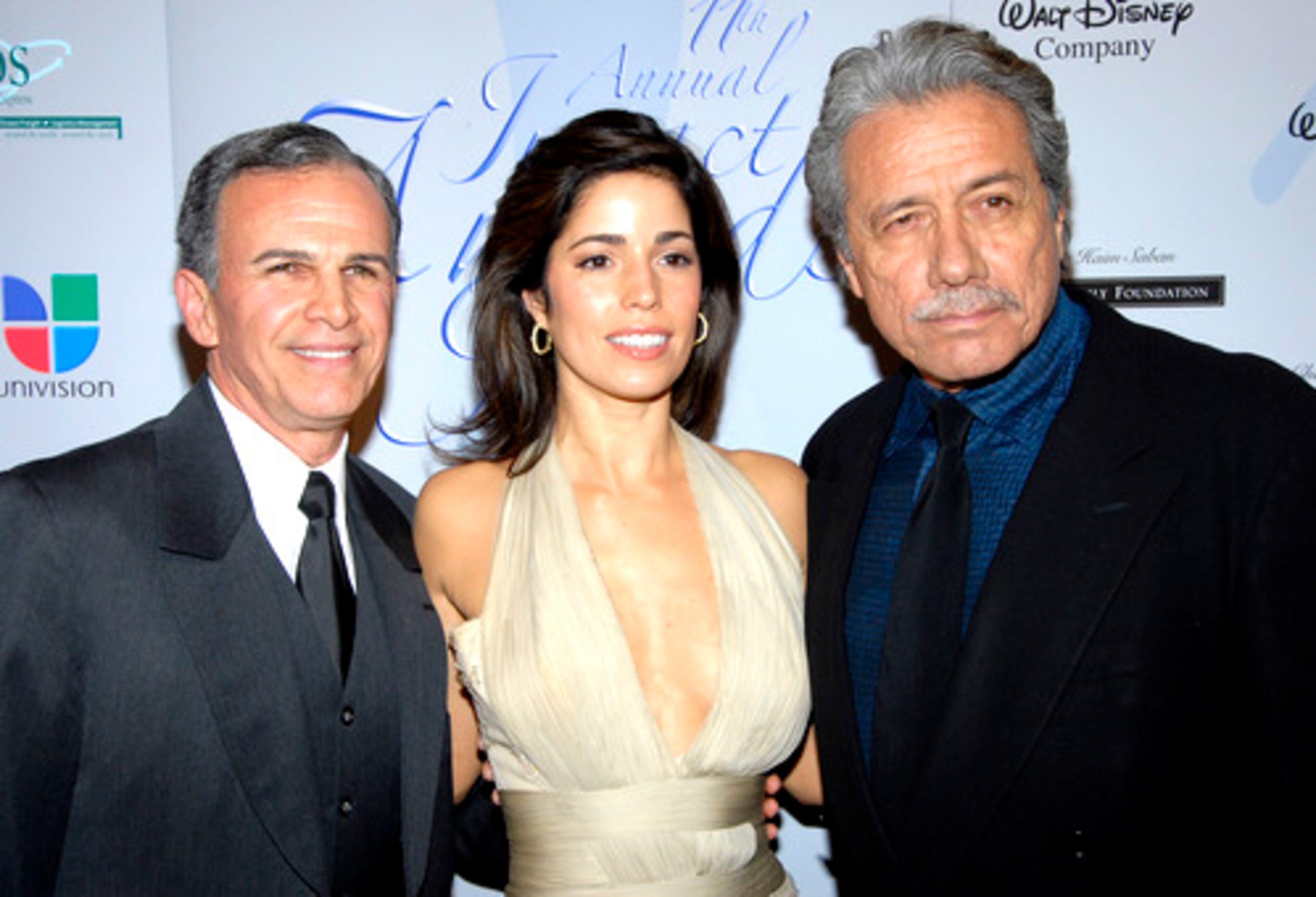 Actors Tony Plana, Ana Ortiz, and Edward James Olmos arrive at the National Hispanic Media Coalition's Impact Awards gala in Beverly Hills, Calif.