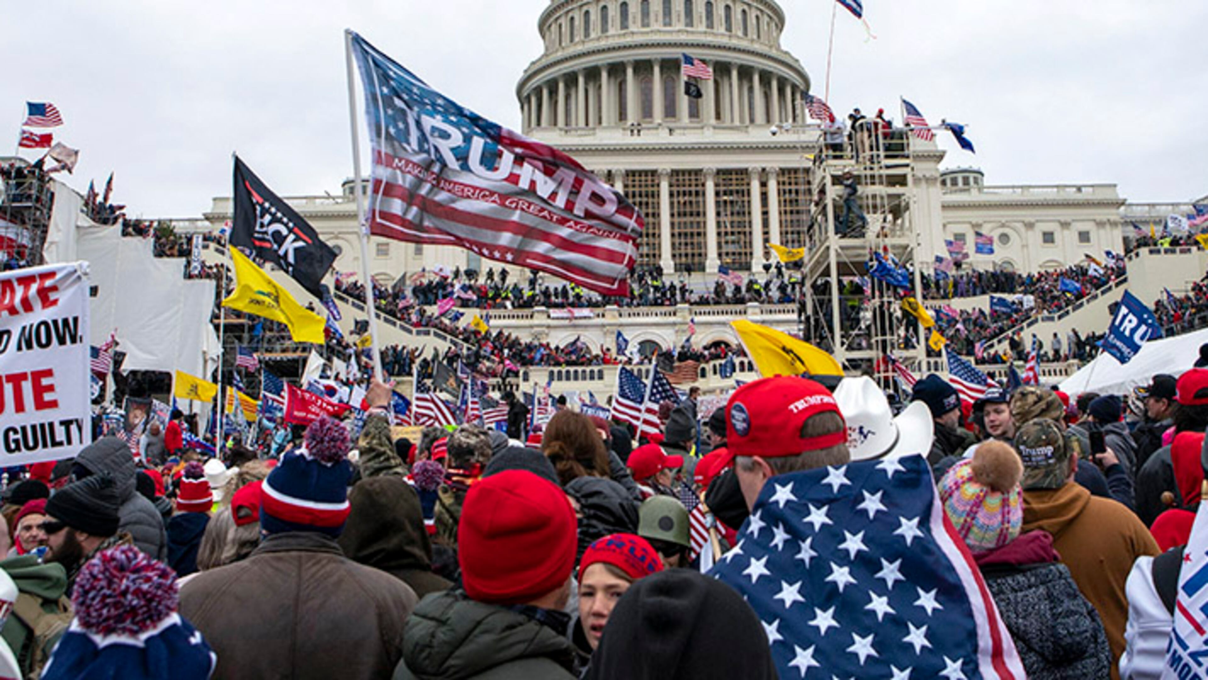 FILE - Rioters loyal to President Donald Trump rally at the U.S. Capitol in Washington on Jan. 6, 2021. A new poll shows that a year after the deadly Jan. 6 insurrection at the U.S. Capitol, only about 4 in 10 Republicans recall the attack by supporters of former President Donald Trump as very violent or extremely violent. A new poll shows that a year after the deadly Jan. 6 insurrection at the U.S. Capitol, only about 4 in 10 Republicans recall the attack by supporters of former President Donald Trump as very violent or extremely violent. (AP Photo/Jose Luis Magana, File)