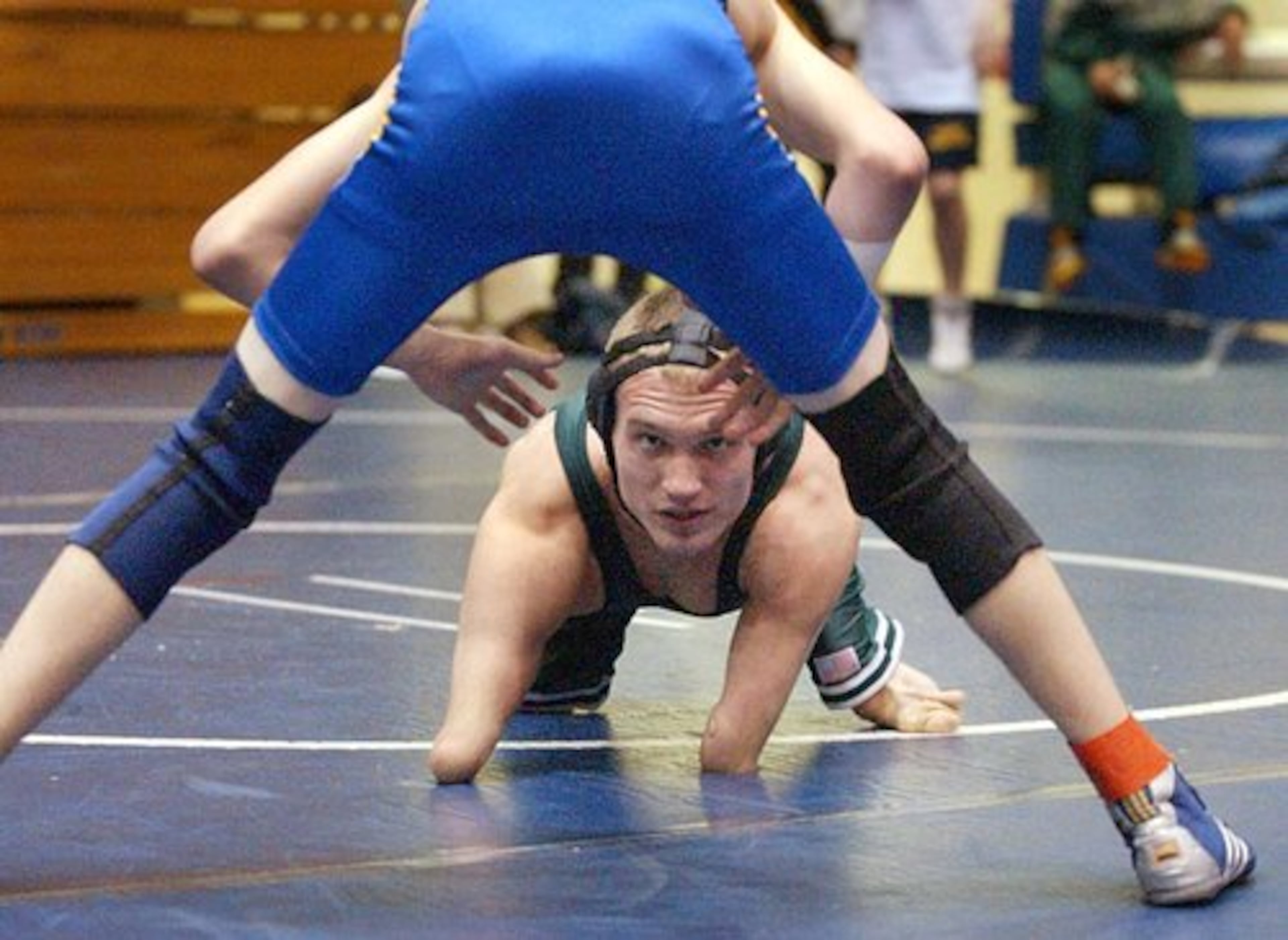 Maynard wrestled for Collins Hill High School in this 2004 photo. He lost all of his matches in his first season but went to finish 35-16 in his career.