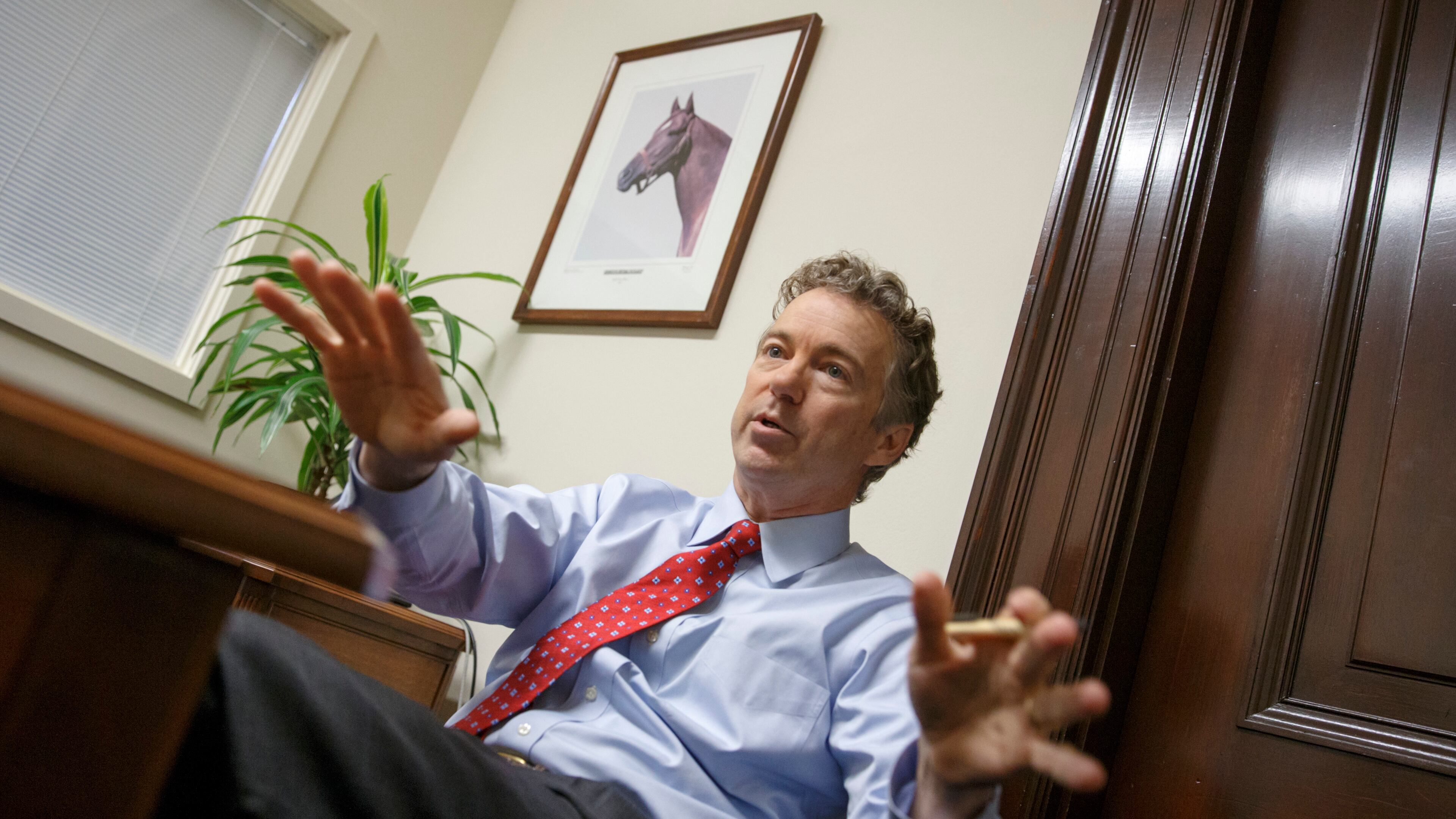 In this photo taken Feb. 10, 2015, Sen. Rand Paul, R-Ky. takes questions during an interview with The Associated Press in his office on Capitol Hill in Washington. Paul is having an easier time finding success inside the cloistered, tradition-bound Senate than on the unpredictable presidential campaign trail. There, it's a hard-to-control world where Paul's every error _ even a televised, "shush" _ ricochets around the internet and gets in the way of the story he's trying to tell. (AP Photo/J. Scott Applewhite) Sen. Rand Paul, R-Ky., in his office on Capitol Hill in Washington earlier this month. He was in Atlanta on Monday. AP/J. Scott Applewhite