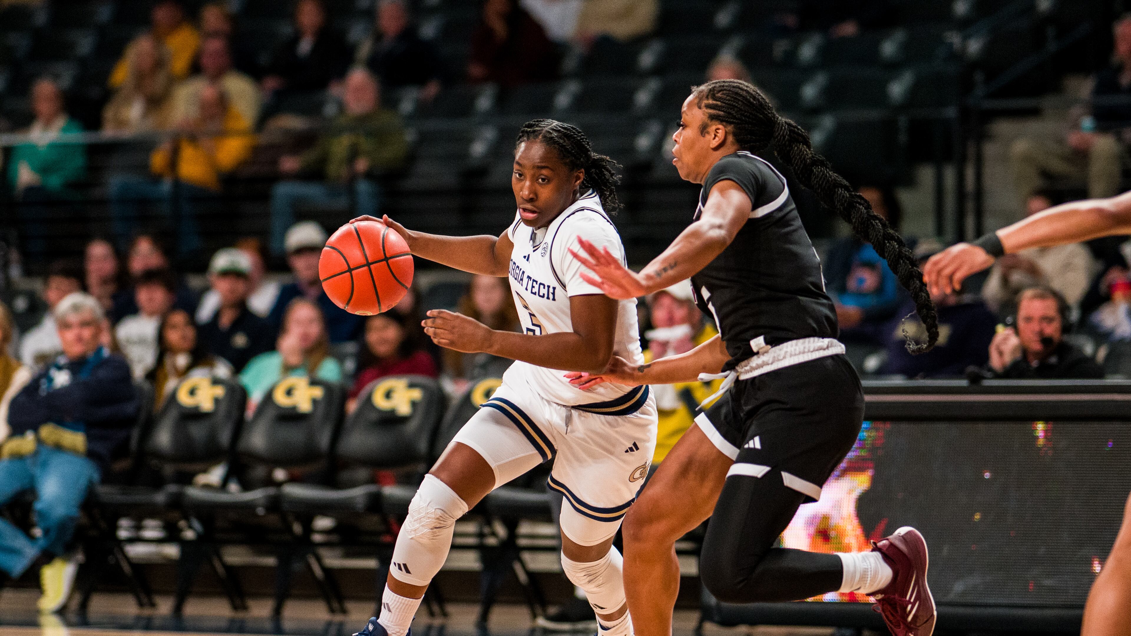 Freshman Dani Carnegie of Georgia Tech drives around a Mississippi State defender on Dec. 4, 2024 at McCamish Pavilion in Atlanta. (Photo by Danny Karnik/Georgia Tech Athletics)
