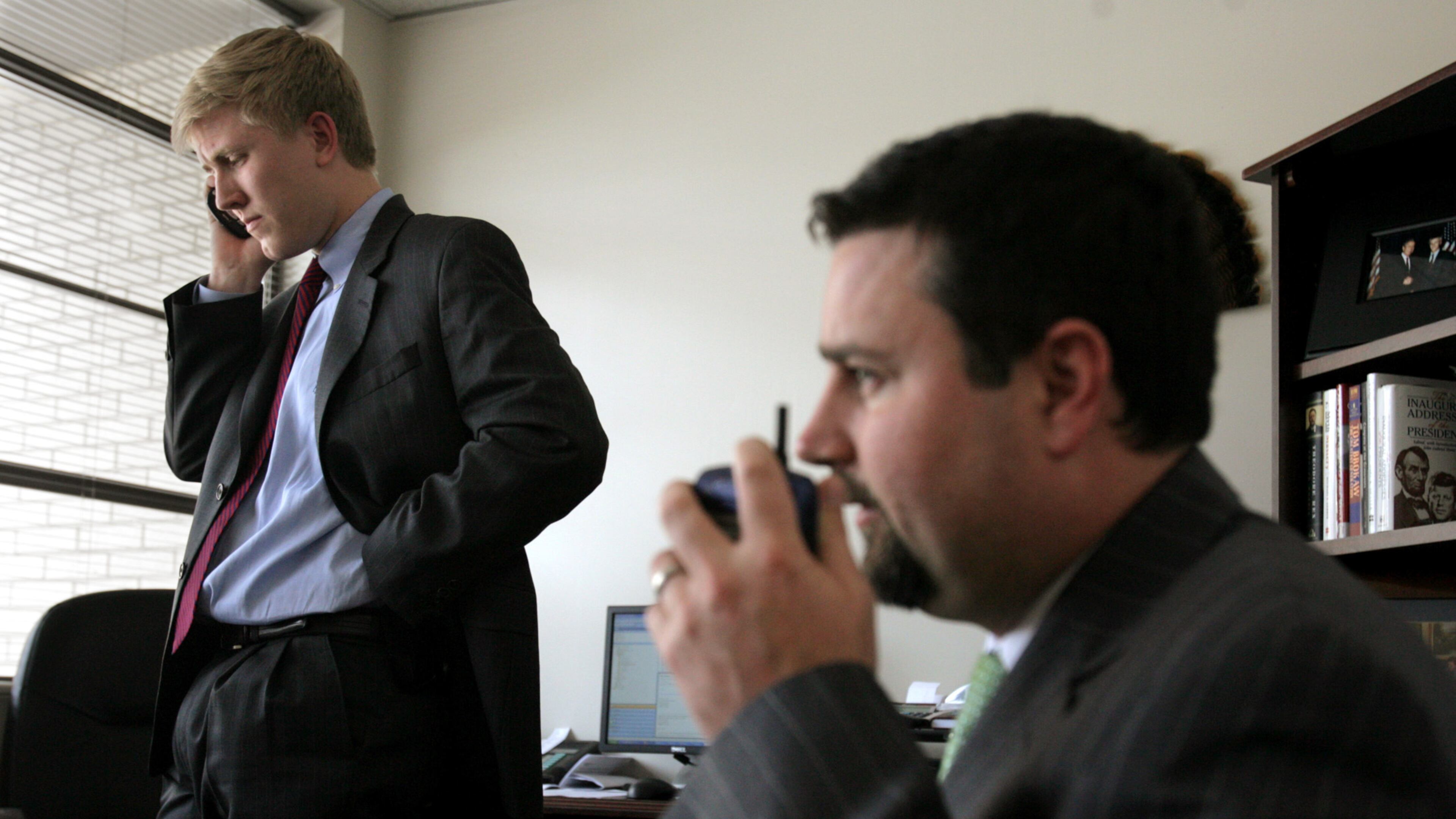 Nick Ayers, left, and Derrick Dickey in Sonny Perdue's campaign headquarters in May 2006. Ayers was Perdue's campaign manager at the time and went on to become Vice President Mike Pence's chief of staff. Dickey, Perdue's onetime press aide, is now U.S. Sen. David Perdue's top aide. (LOUIE FAVORITE/AJC staff)