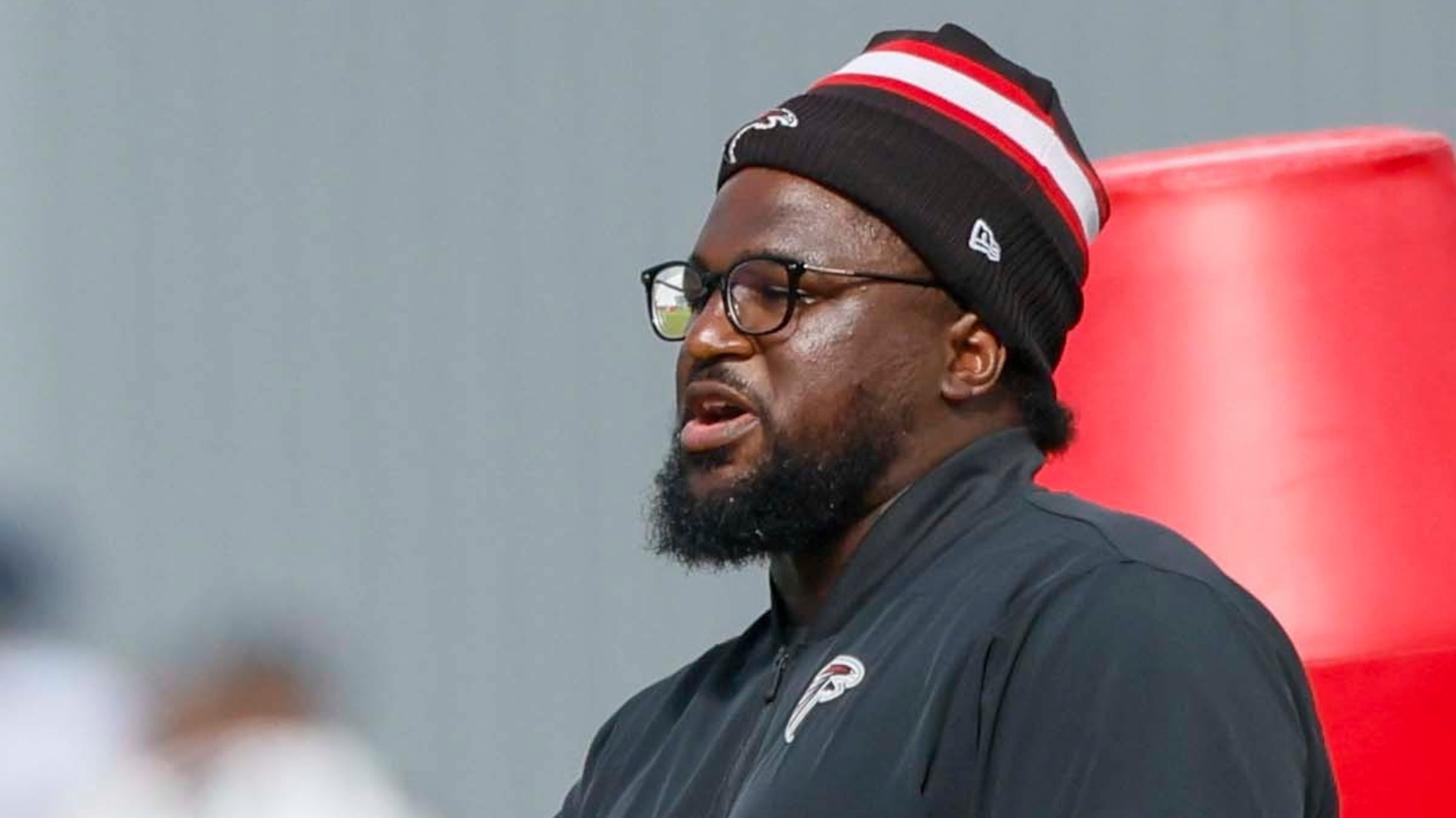 Falcons defensive line coach Nate Ollie, shown here during a joint practice with the Titans last year, creates natural, meaningful bonds with his players. (Miguel Martinez/AJC 2025)