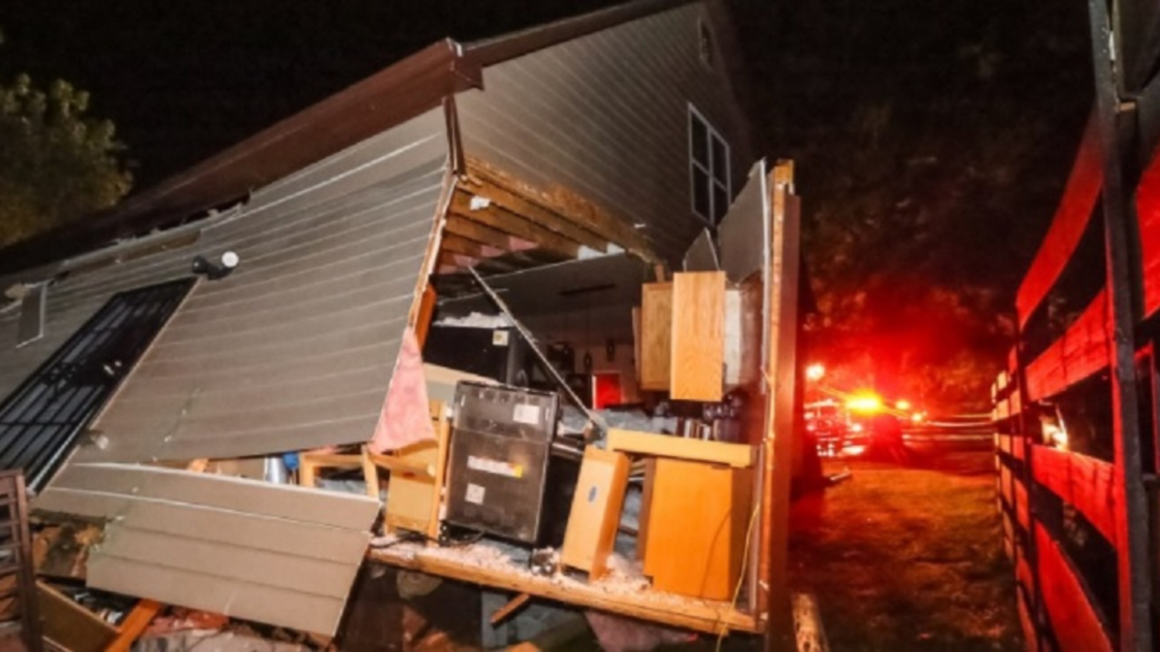 A man was injured when a train left the tracks and crashed into a house early Thursday in Atlanta.