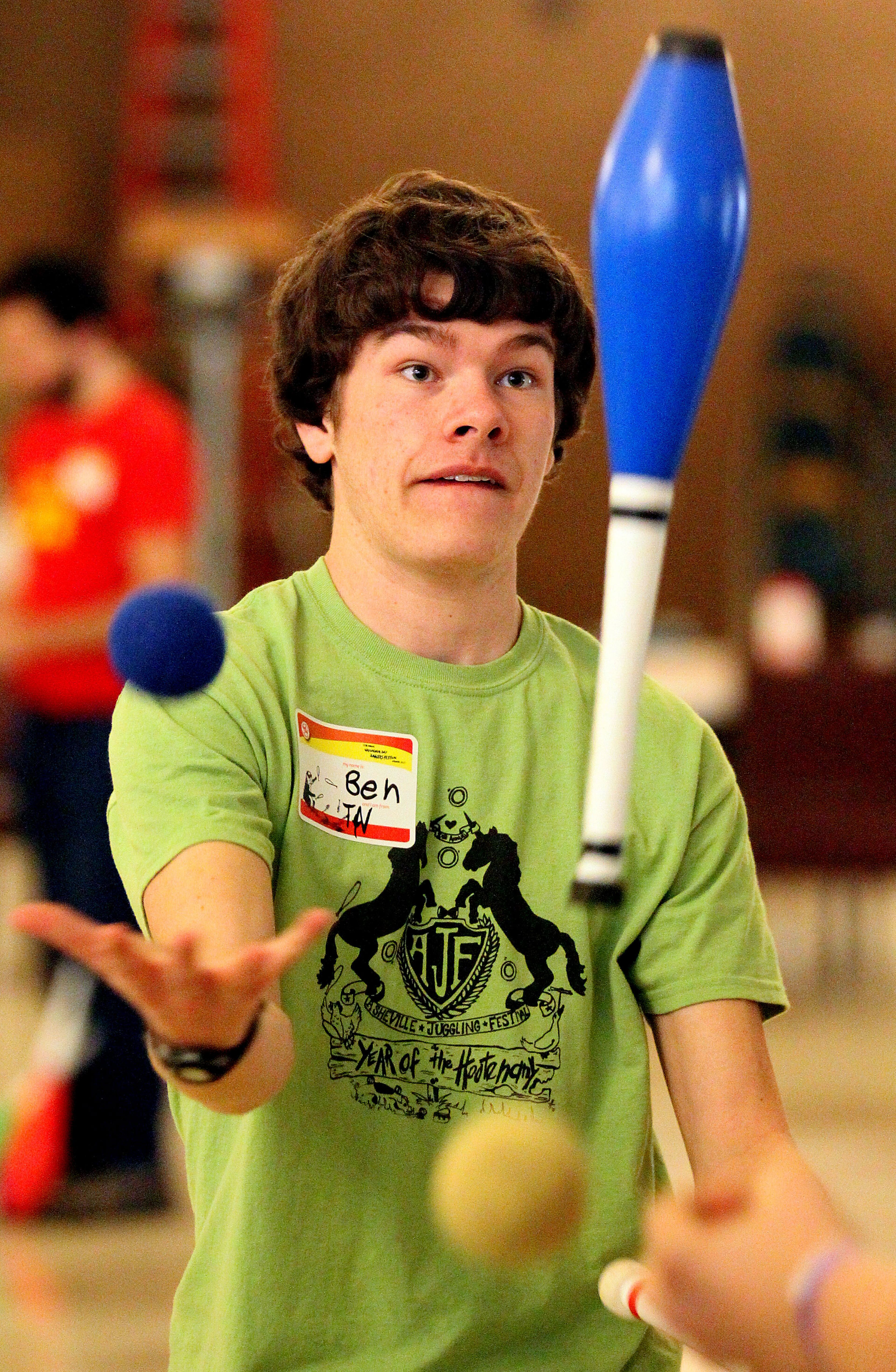 Ben Mobley concentrates while juggling pins & balls at 35th Annual Ground Hog Day Jugglers Festival at the Yaarab Shrine Center Auditorium in Atlanta on Saturday Feb. 2nd, 2013. The festival sponsored by The Atlanta Jugglers Association featuring juggling competitions, workshops, unicycling, yo-yoing, hooping, a light extravaganza & a late night cabaret.