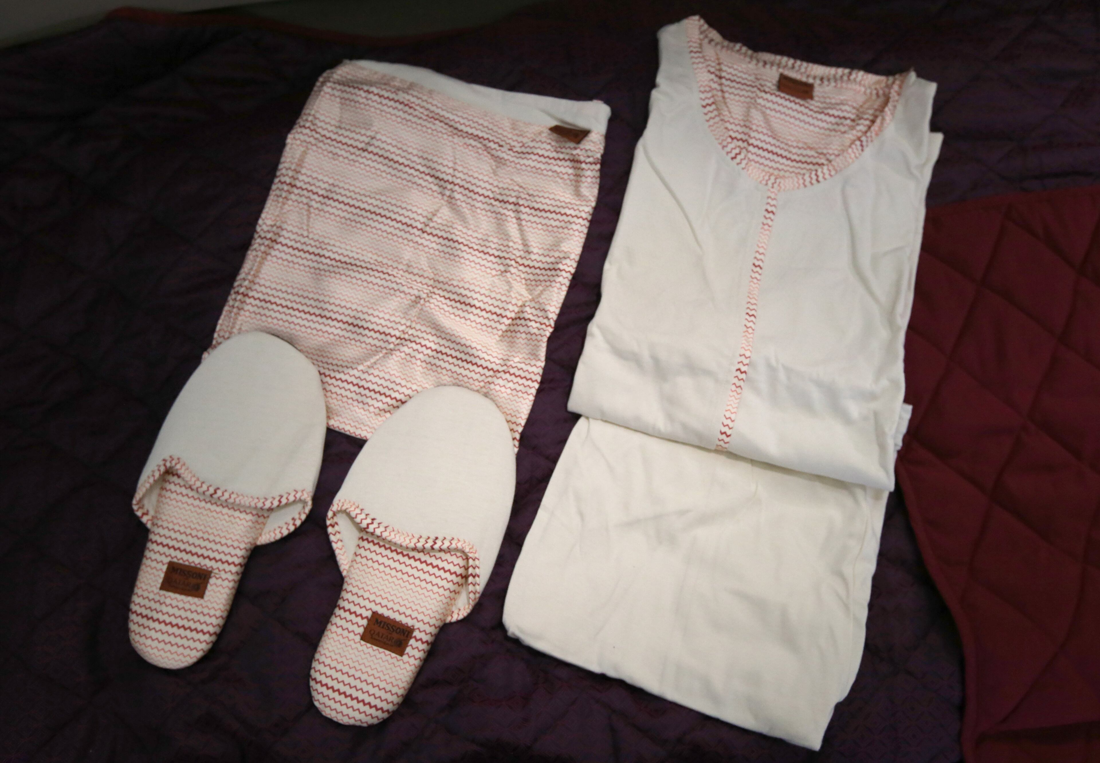 Pajamas sit on one of the fold-out beds in the first-class cabin in Qatar Airways A380 Wednesday evening June 1, 2016 during a press event to mark the inaugural flight to Doha. The airline brought the plane in for the first flight, but will be flying the route with a 777. Ben Gray / bgray@ajc.com