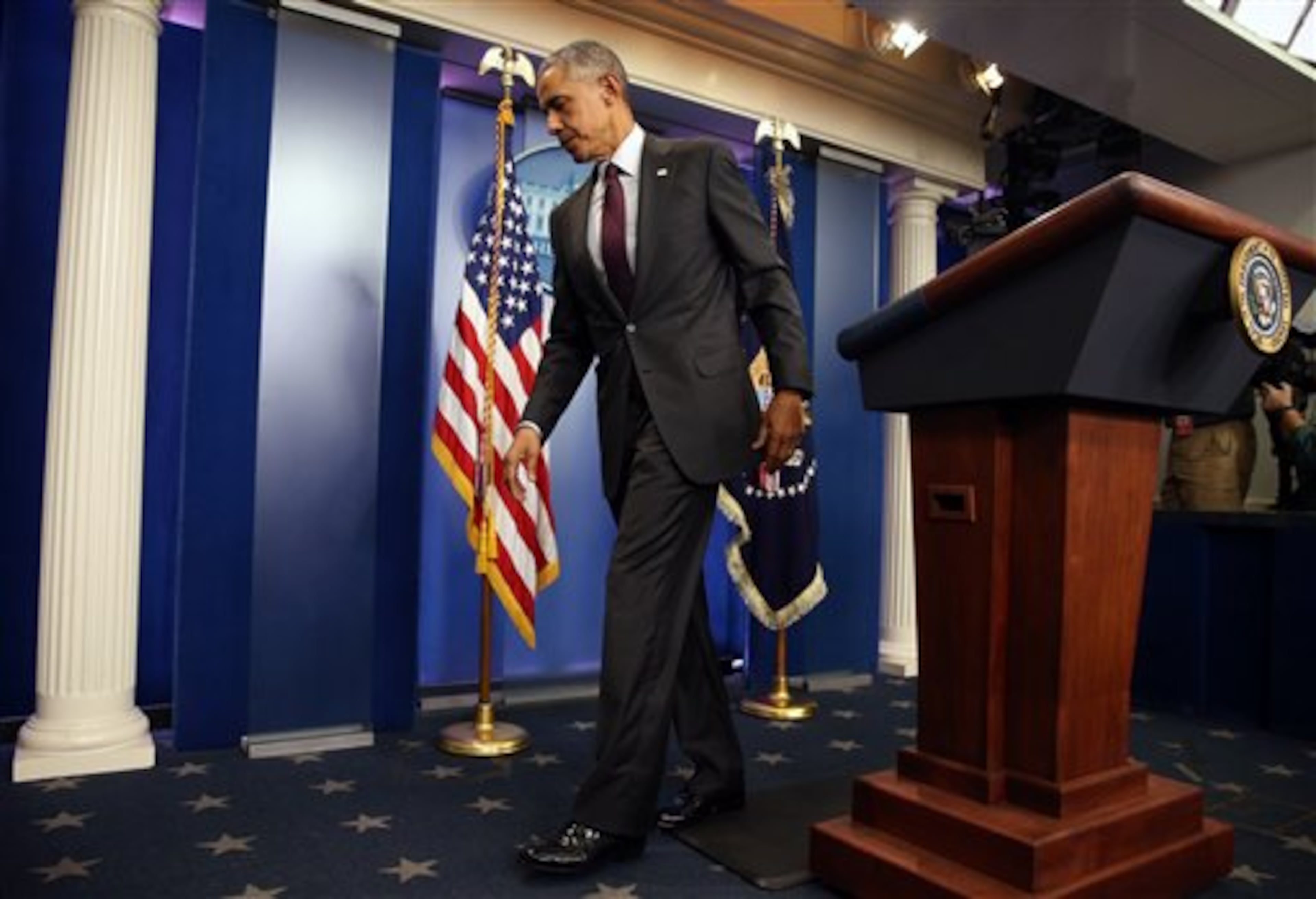 Click on this link for updates on the Oregon school shooting. President Barack Obama leaves the podium after speaking in the Brady Press Briefing Room at the White House in Washington, Thursday, Oct. 1, 2015, about the shooting at the community college in Oregon. The shooting happened at Umpqua Community College in Roseburg, Ore., about 180 miles south of Portland. (AP Photo/Andrew Harnik)