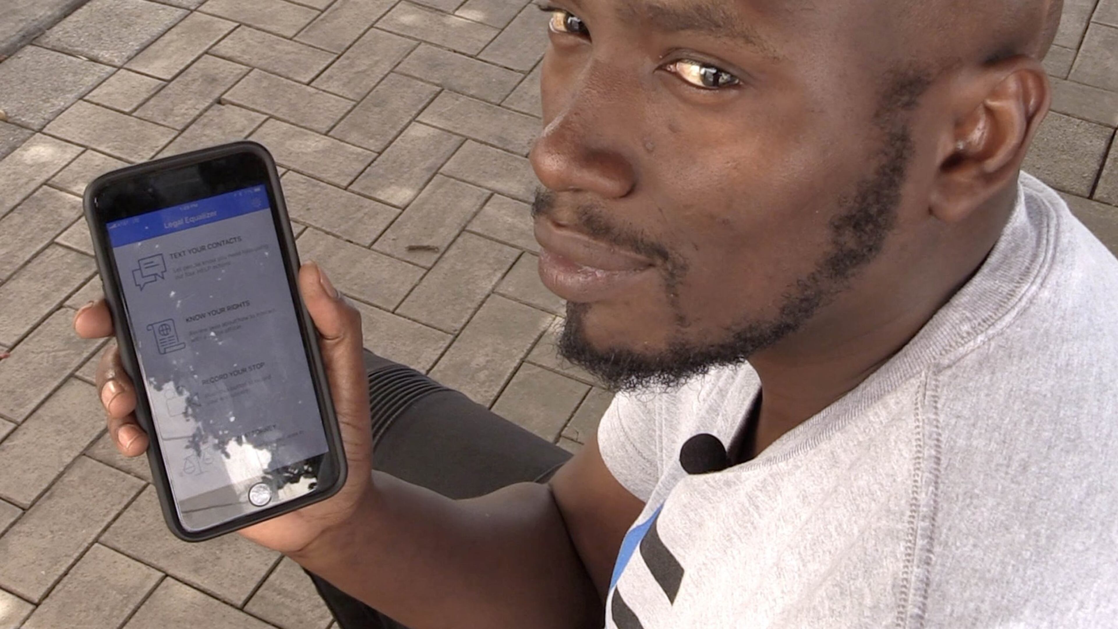 Mbye Njie is CEO of Legal Equalizer, a smartphone app that enables drivers who are pulled over to record police actions, read briefs about their legal rights and automatically text up to five pre-determined, trusted contacts that you’ve been stopped as well as send GPS coordinates, on Friday, February 16, 2018. (David T. Foster III/Charlotte Observer/TNS)