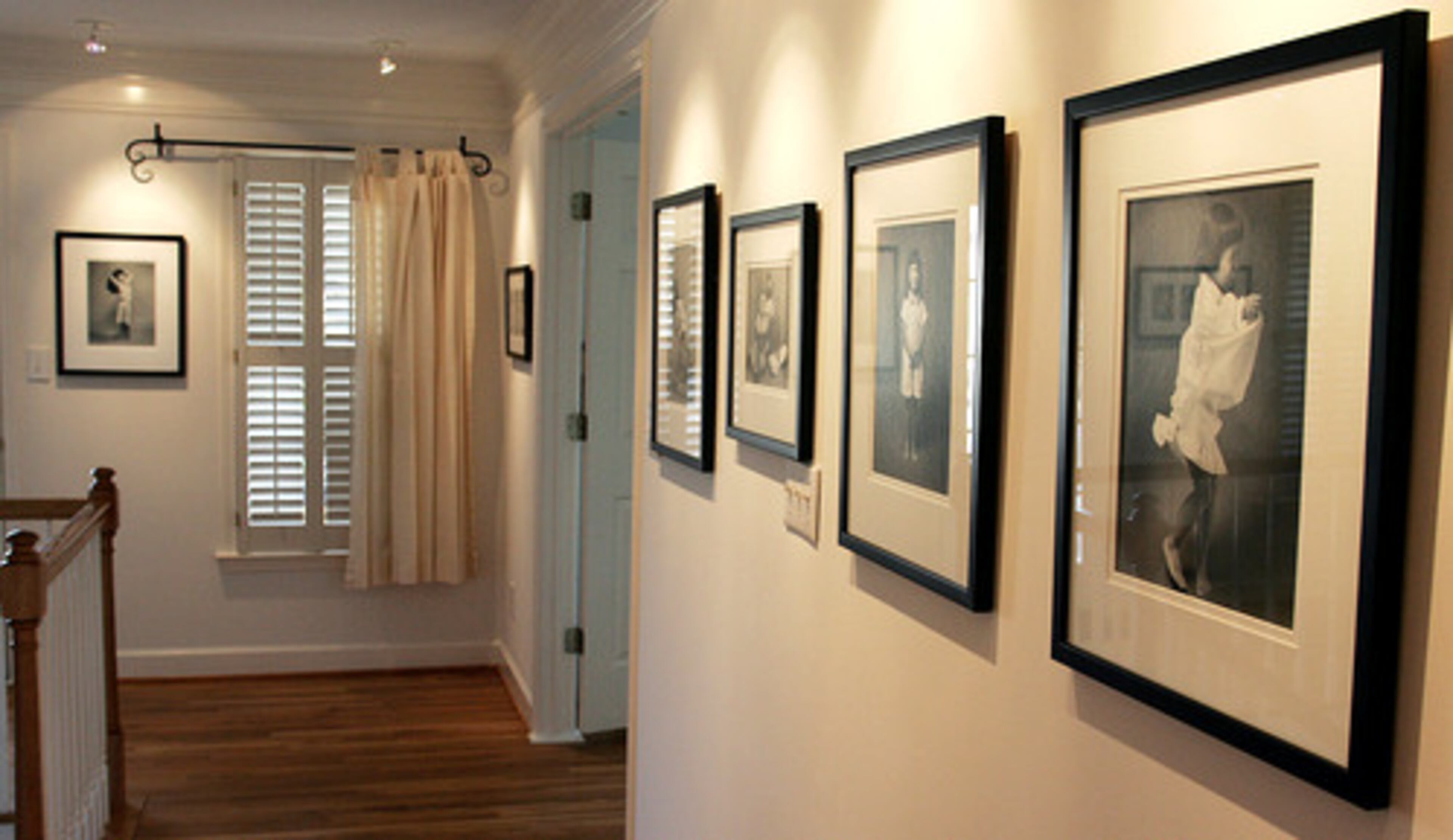 A photo gallery of Lyla's childhood winds through the second floor of the home.