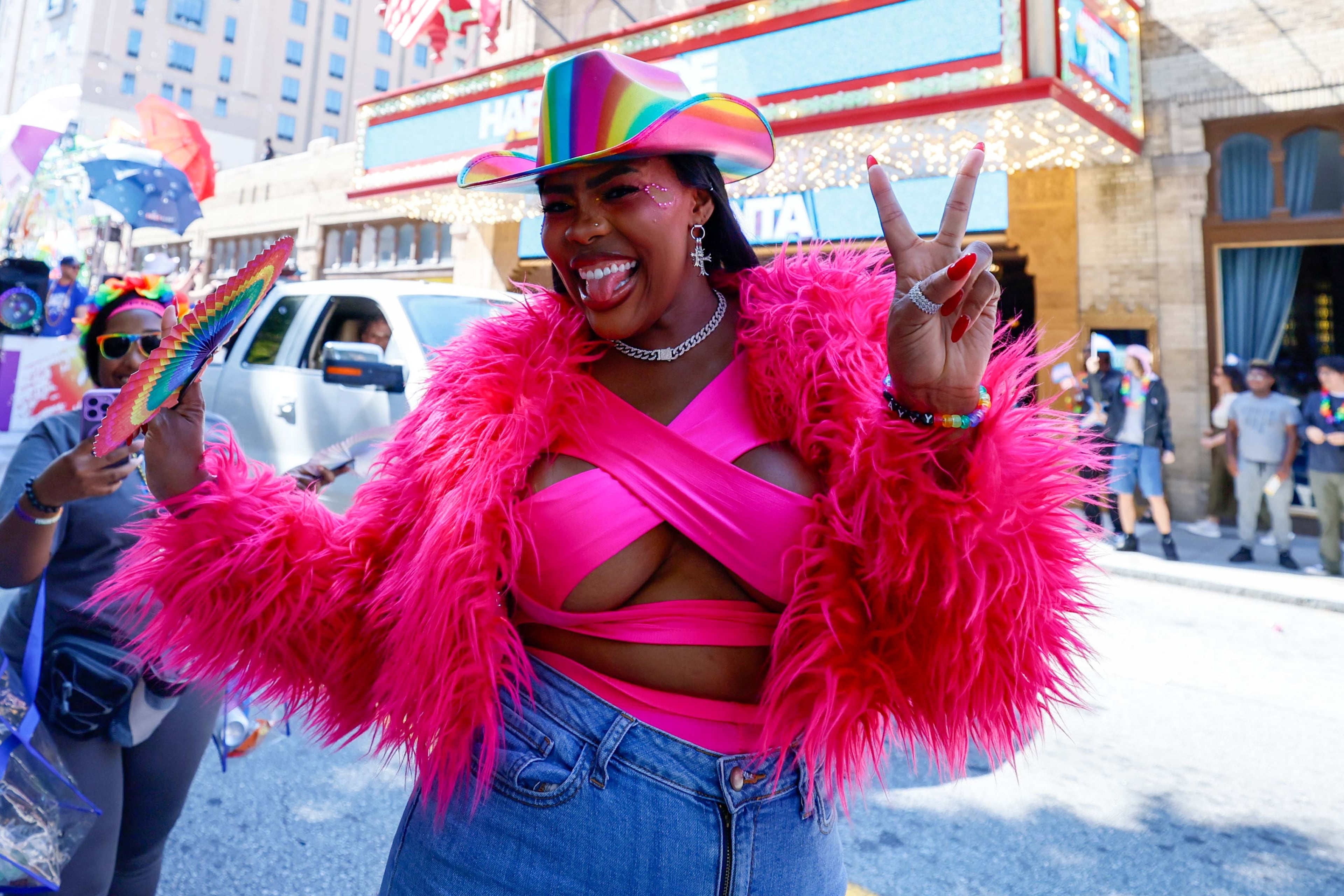Artesia Peluso with MARTA poses as she celebrates with the annual Pride Parade in Atlanta on Sunday, Oct. 13, 2024.
(Miguel Martinez / AJC)