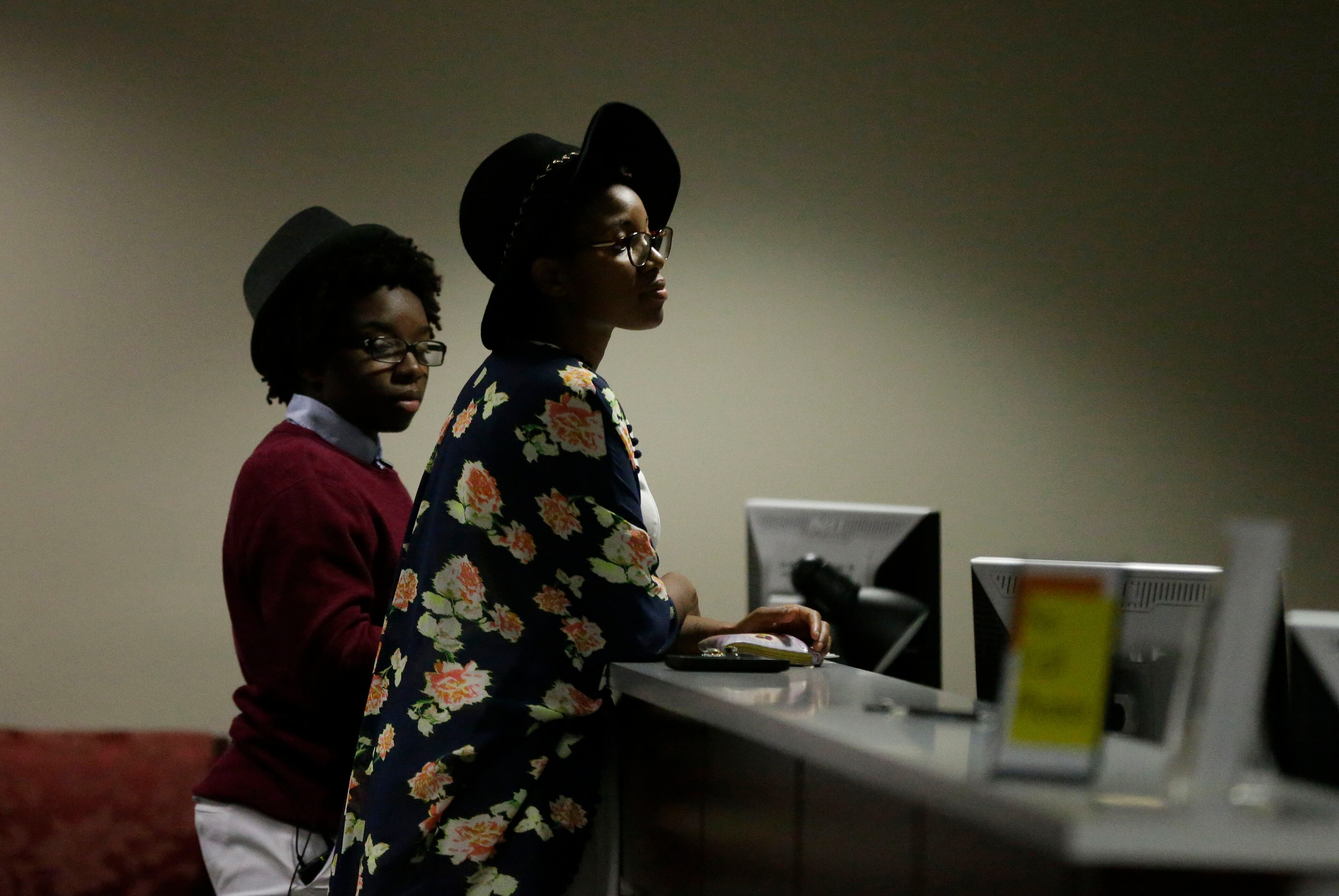 FILE - In this Feb. 9, 2015, file photo, Shant�olfe, left, and Tori Sisson, right, wait for their marriage license to be processed before becoming the first couple to file their marriage license in Montgomery, Ala. The U.S. Supreme Court declared Friday, June 26, 2015, that same-sex couples have a right to marry anywhere in the country, in a culmination of two decades of litigation over marriage, and gay rights generally. (AP Photo/Brynn Anderson, file)