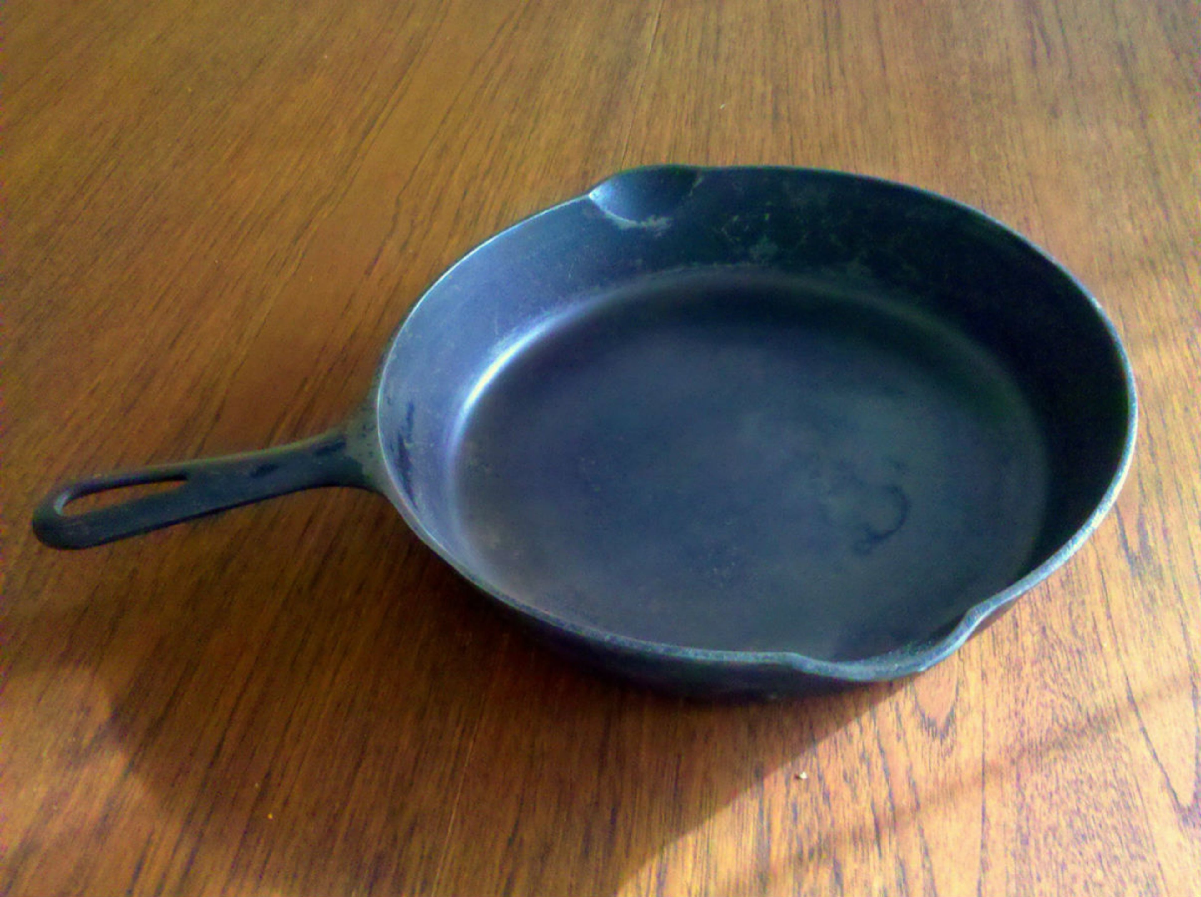 In 2013, 266 participants set the record for the most people simultaneously tossing a skillet for a distance of at least 9 feet, 10 inches.