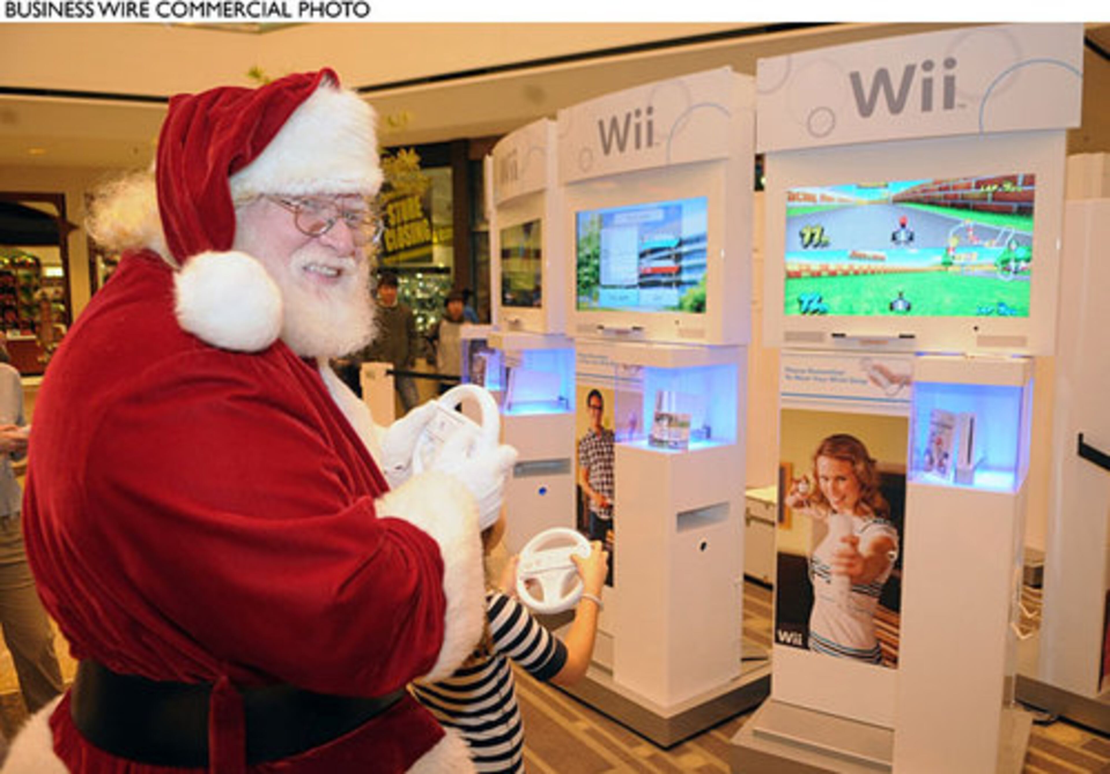Santa Claus has to try out the latest gadgets to know what to bring to the kids. He plays the Nintendo Wii on Black Friday in Pleasanton, Calif.