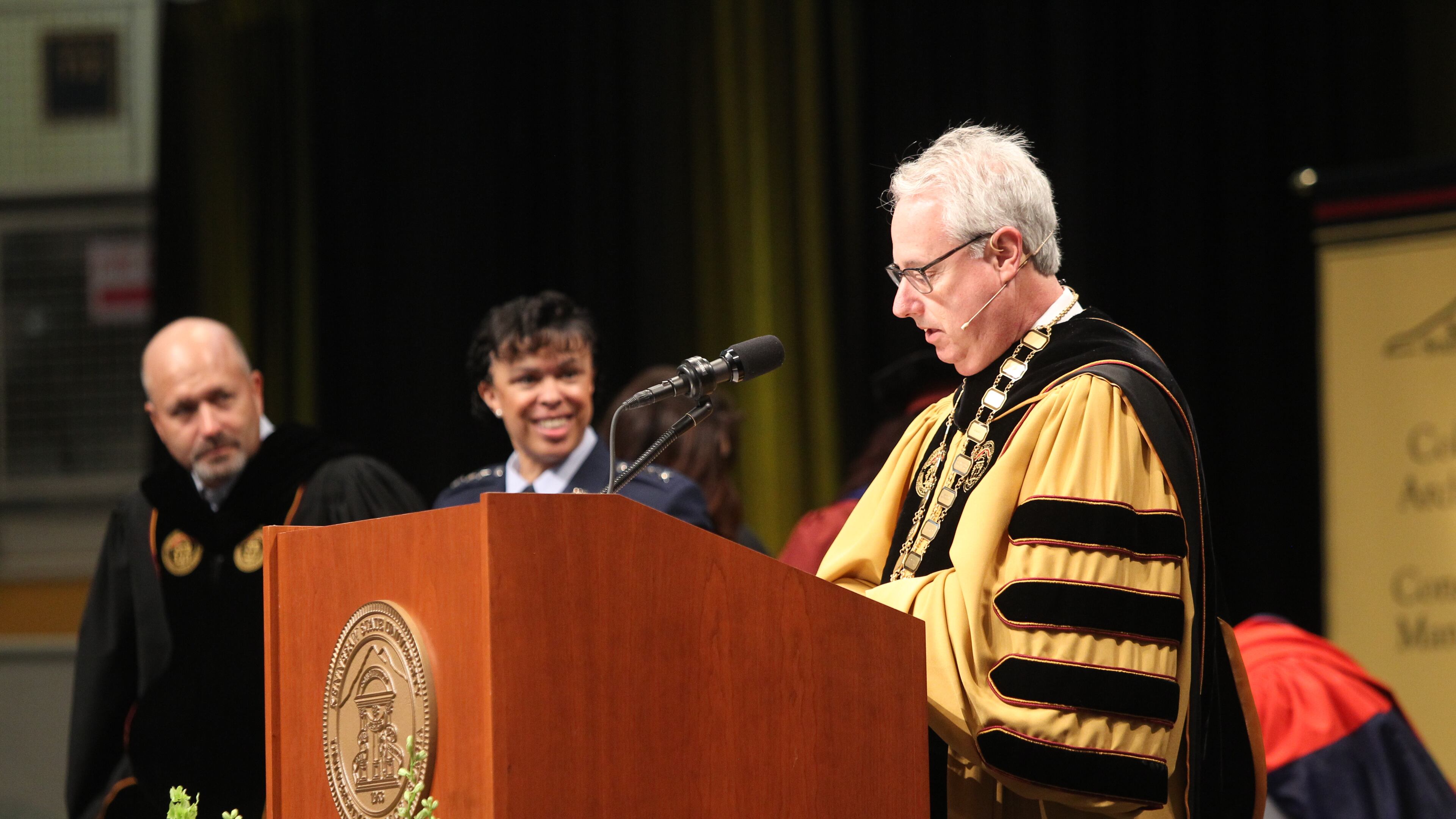 Students along with their family and friends from Kennesaw State University in the College of Humanities and Social Sciences attend their Commencement ceremony to graduate from the university in Kennesaw, Georgia, on May 10, 2017. President Sam Olens addresses the crowd and students one last time before releasing them. (HENRY TAYLOR / HENRY.TAYLOR@AJC.COM)