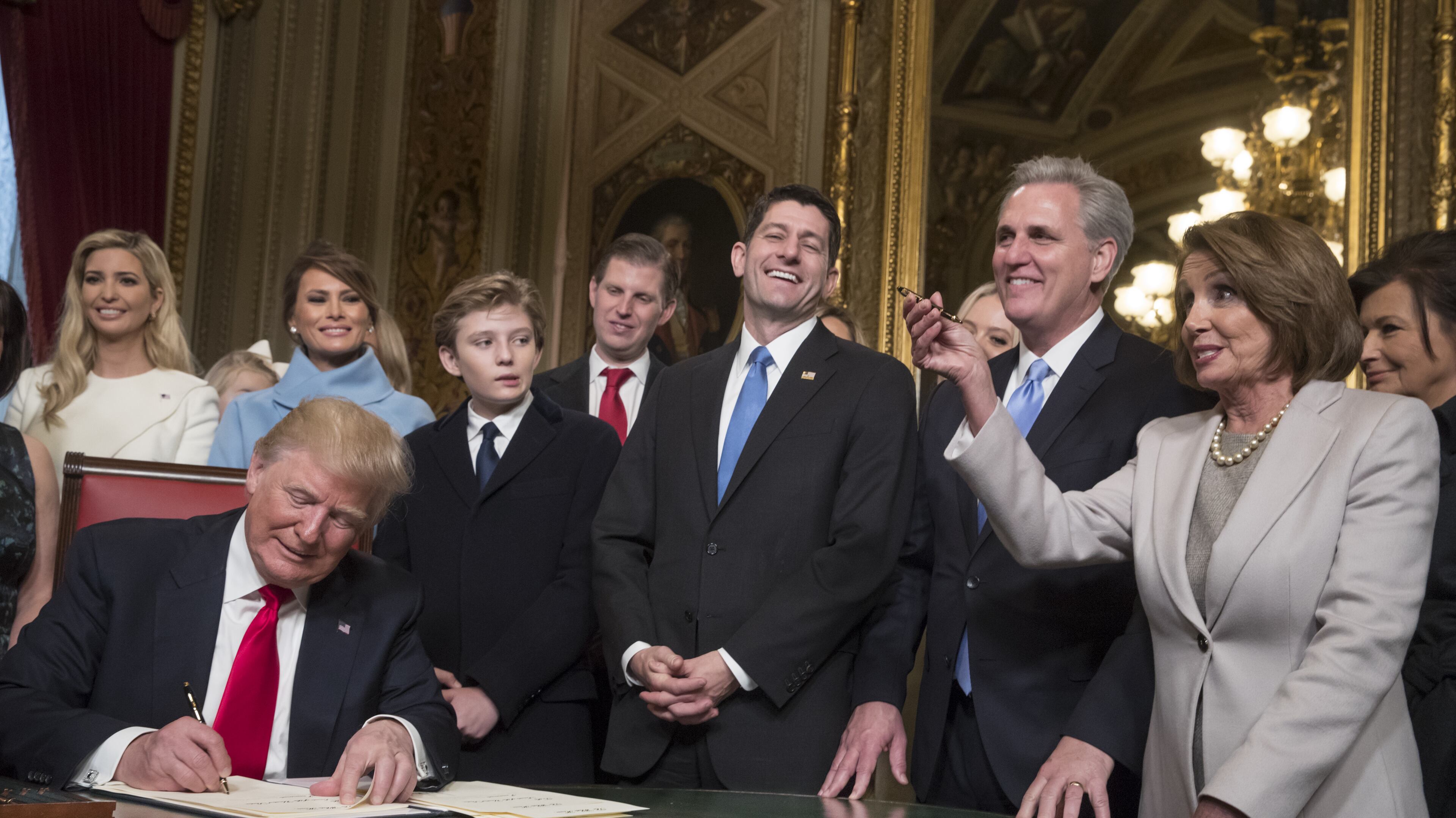 President Donald Trump is joined by the Congressional leadership and his family as he formally signs his cabinet nominations into law, in the President's Room of the Senate, at the Capitol in Washington, Friday, Jan. 20, 2017. (Photo by J. Scott Applewhite - Pool/Getty Images)